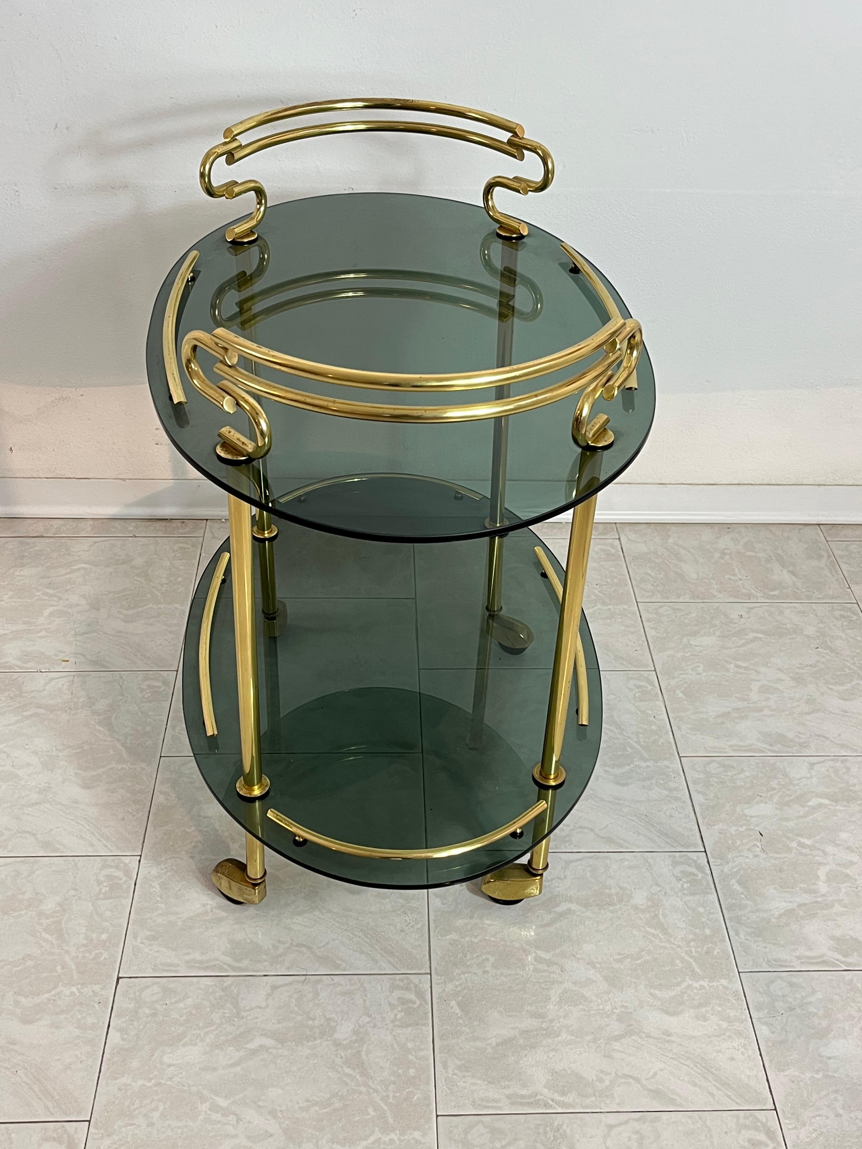 Italian Mid-Century Brass Cart with Caster Wheels, Smoked Glass Tops, 1960s In Good Condition For Sale In Palermo, IT