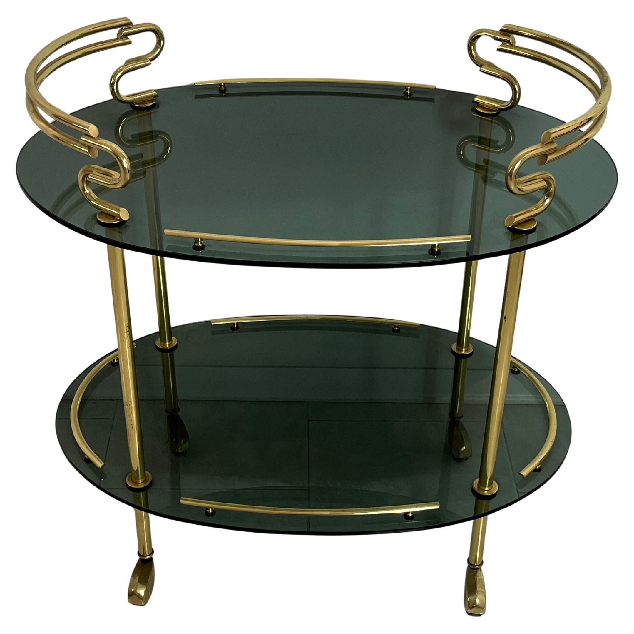 Italian Mid-Century Brass Cart with Caster Wheels, Smoked Glass Tops, 1960s For Sale