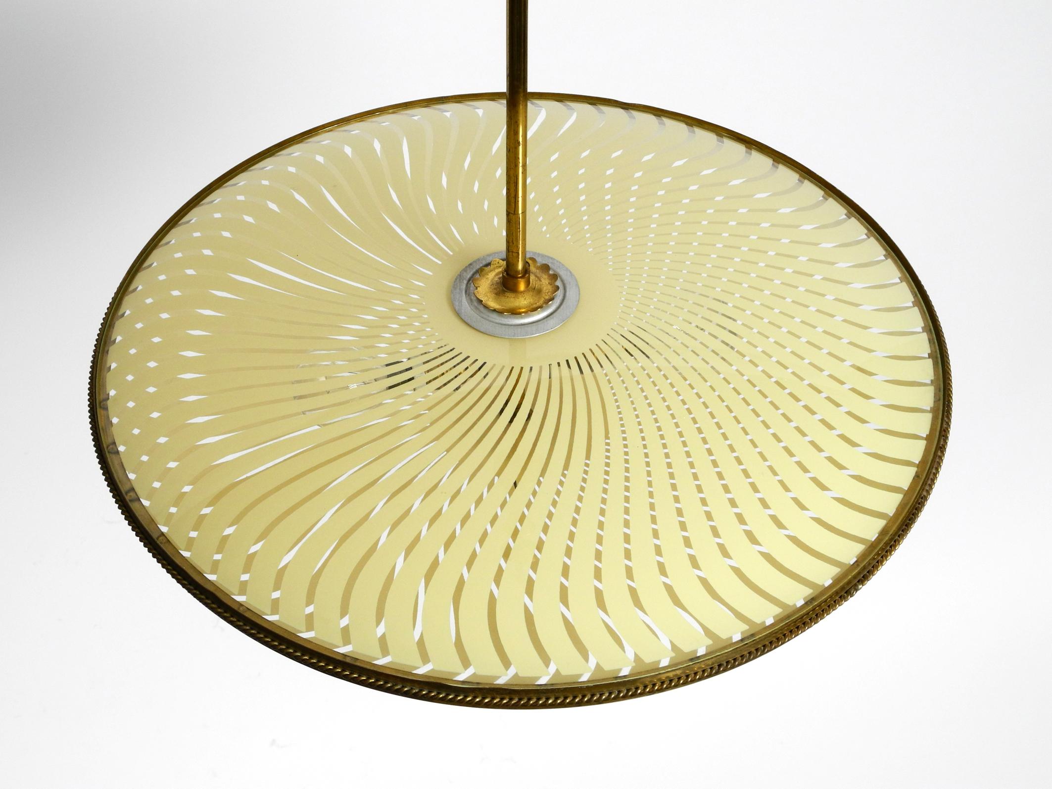 Italian Mid-Century Brass Ceiling Lamp with an Elegant Double Glass Lampshade In Good Condition For Sale In München, DE