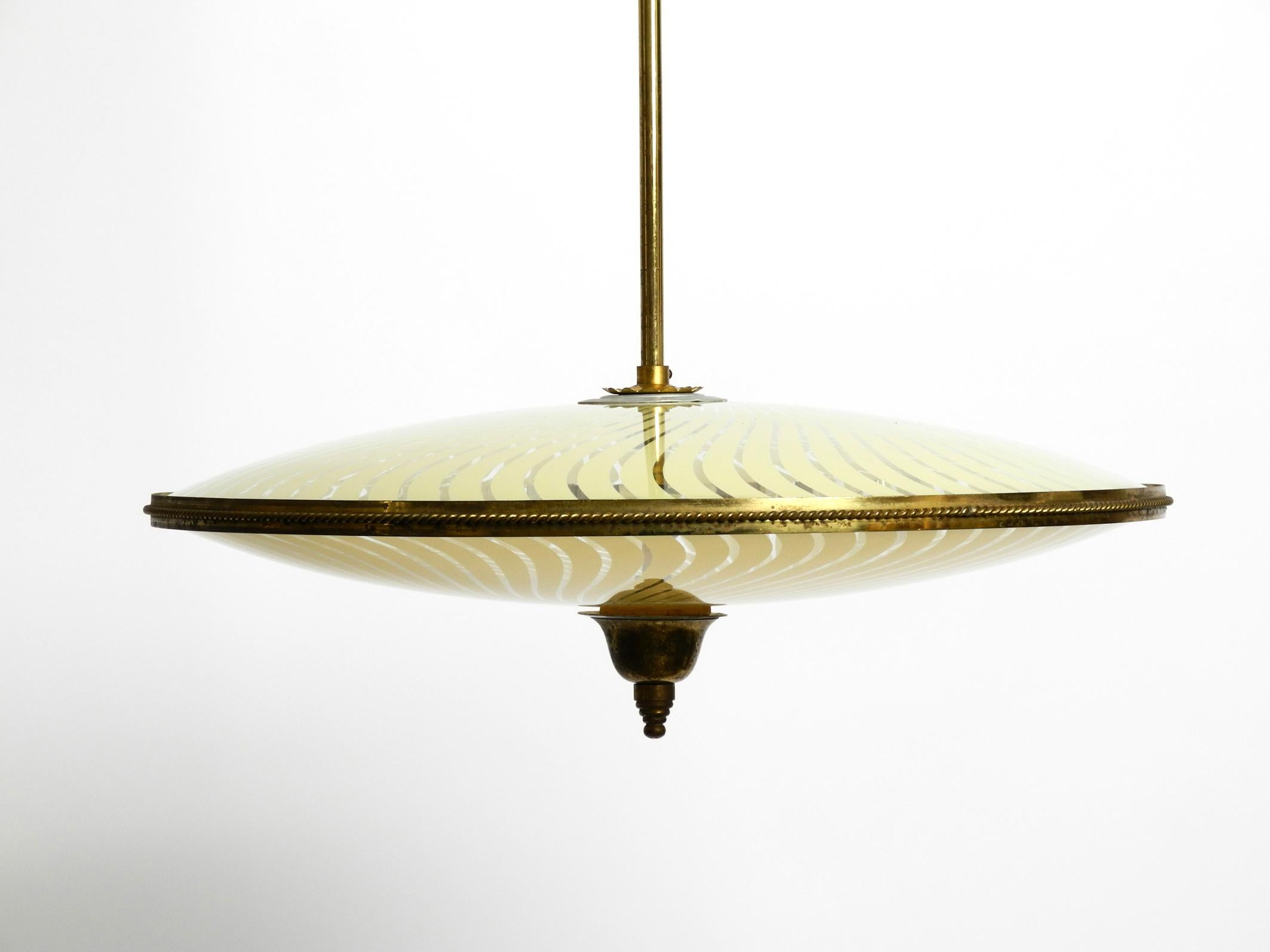 Mid-20th Century Italian Mid-Century Brass Ceiling Lamp with an Elegant Double Glass Lampshade For Sale