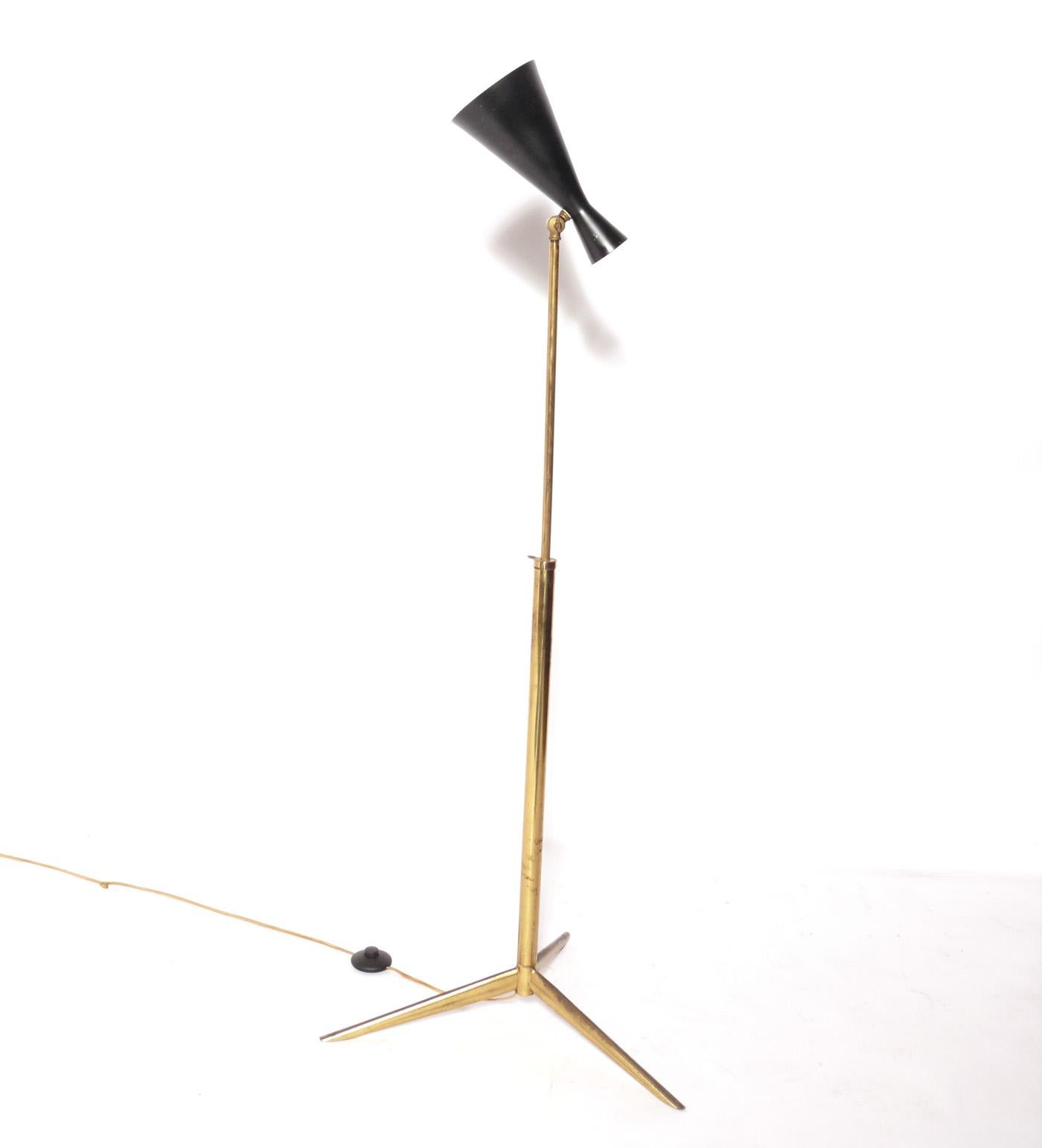 Italian mid century brass floor lamp, Italy, circa 1950s. Adjustable height and shade. Retains warm original patina. It has been rewired and is ready to use.