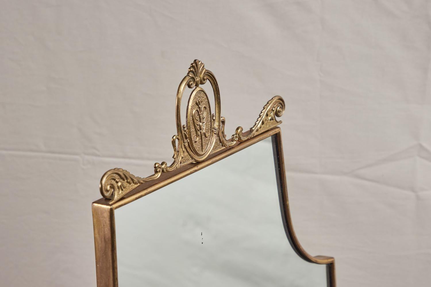 Italian Mid Century Brass Mirror with Decorative Crest In Good Condition In Pasadena, CA