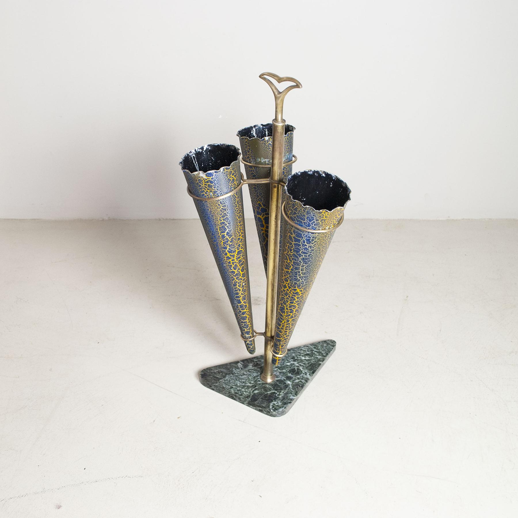 Umbrella stand in worked metal, marble base, brass structure, worked metal containers, production end of 50s.
