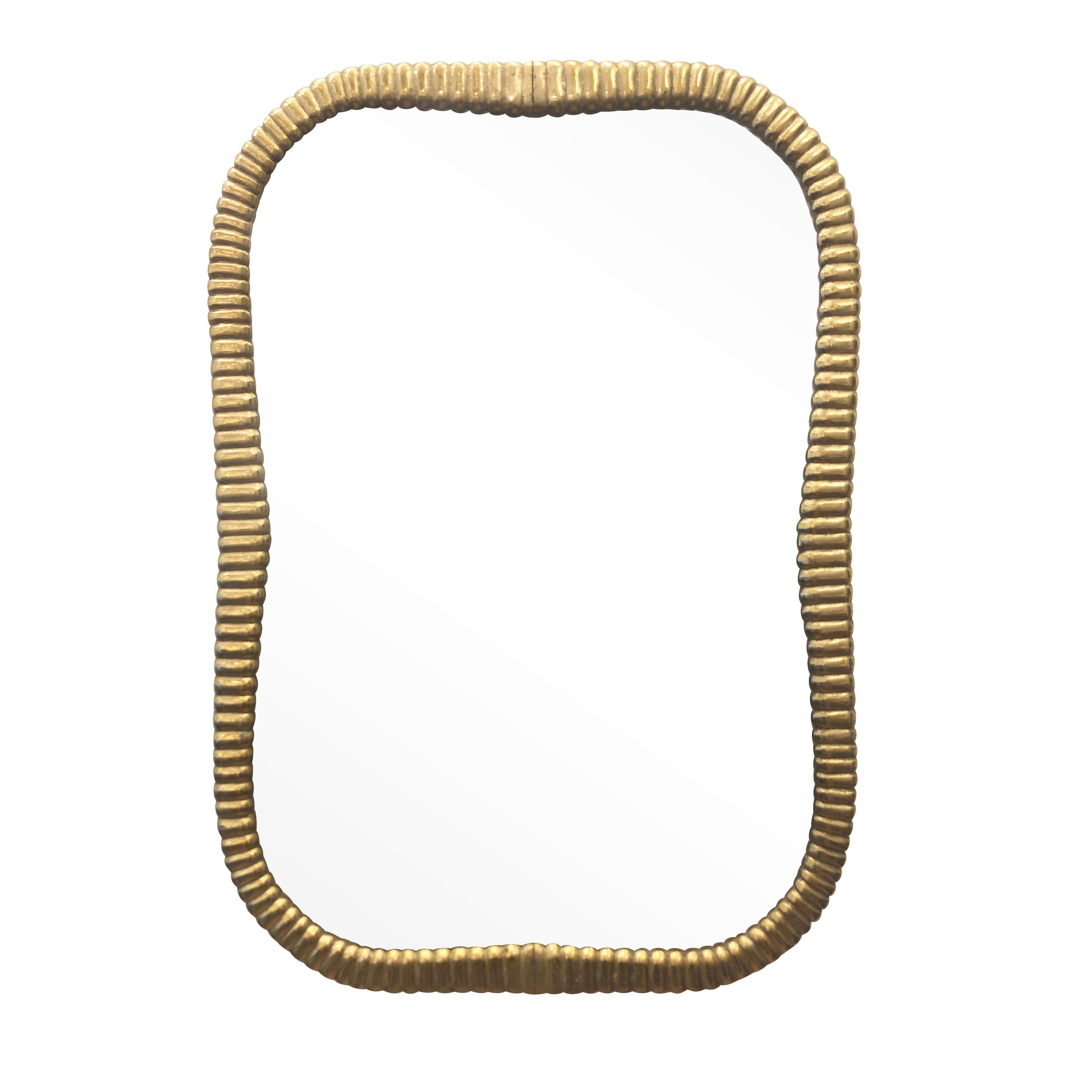 Italian midcentury mirror with a cast bronze frame

Condition: Excellent vintage condition, minor wear consistent with age and use

Measures: Width 21”

Depth 1”

Height 30.5”.

  