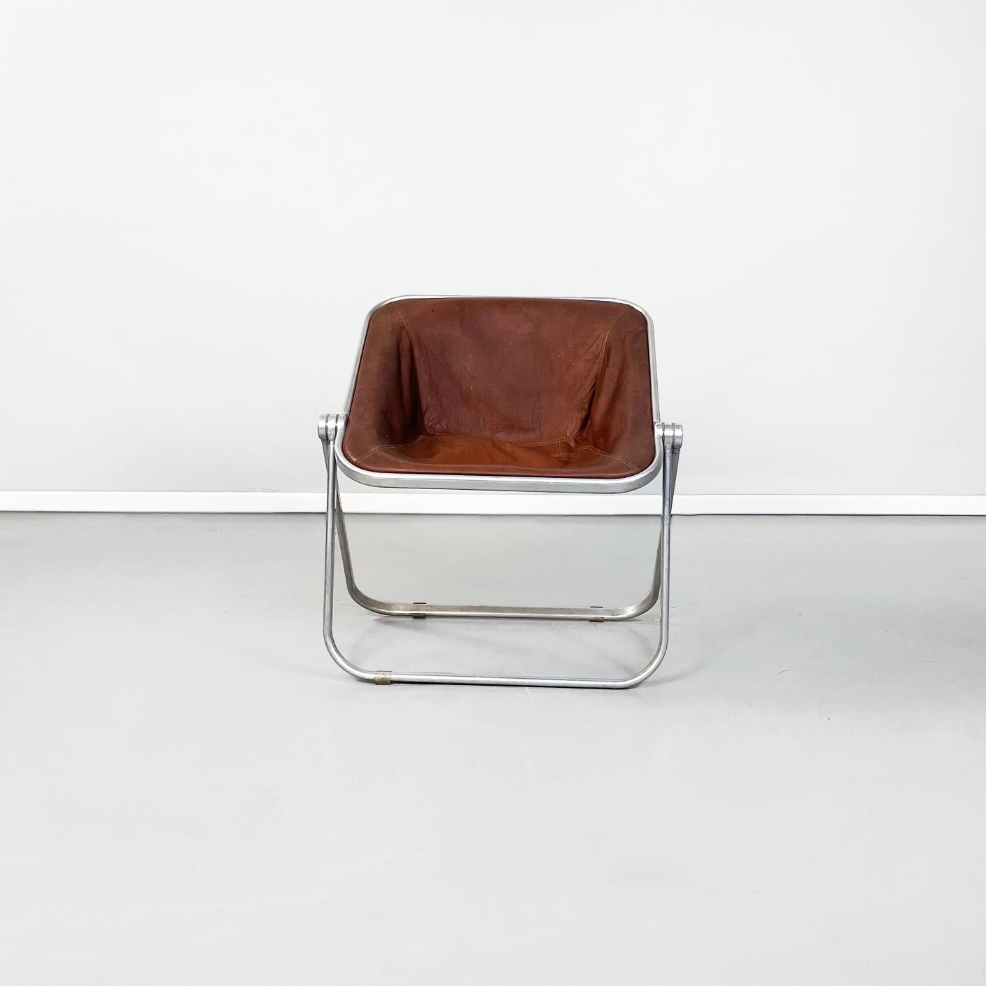 Italian mid-century brown leather armchair Plona by Piretti for Anonima Castelli, 1970s
Armchair model Plona with chromed oval aluminum tube structure and original brown leather seat.
Produced by Anonima Castelli in 1970s and designed by Giancarlo