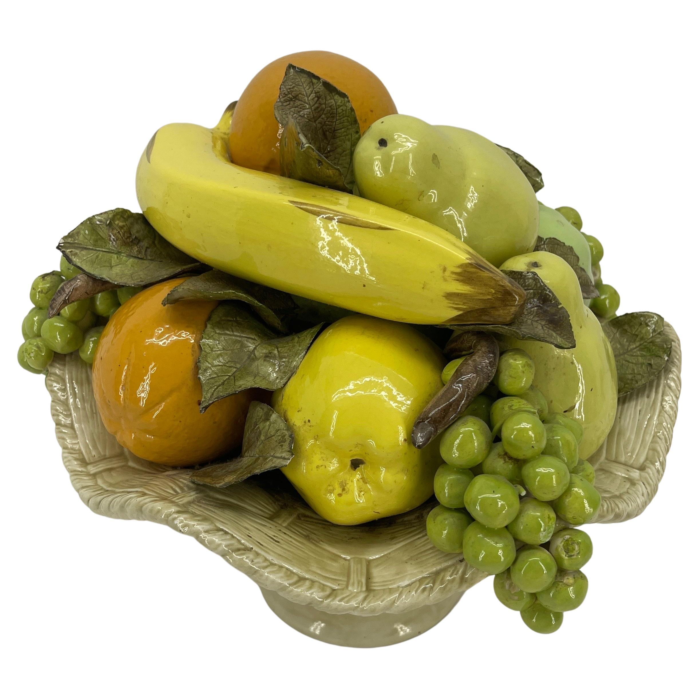 Vintage Glazed Ceramic Fruit Basket Compote Sculpture Centerpiece, 1950's Italy

Fabulous Italian glazed ceramic fruit basket figure. This polychrome compote is handmade with the greatest attention to detail. The basket itself with the intricate