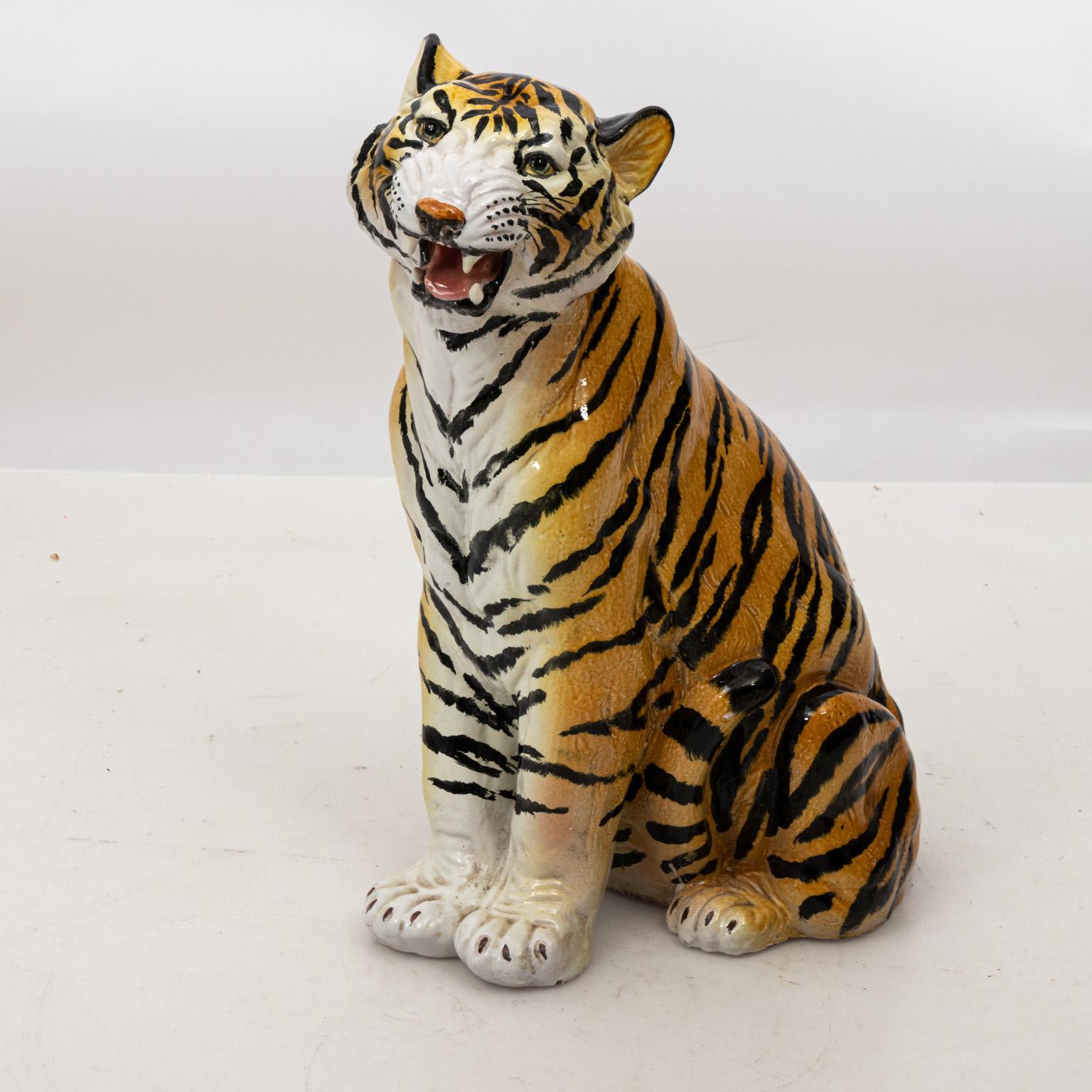 Tall, glazed pottery ceramic tiger that stands two feet high, circa 1950s. Please note of wear consistent with age including minor paint and glaze loss. Made in Italy.