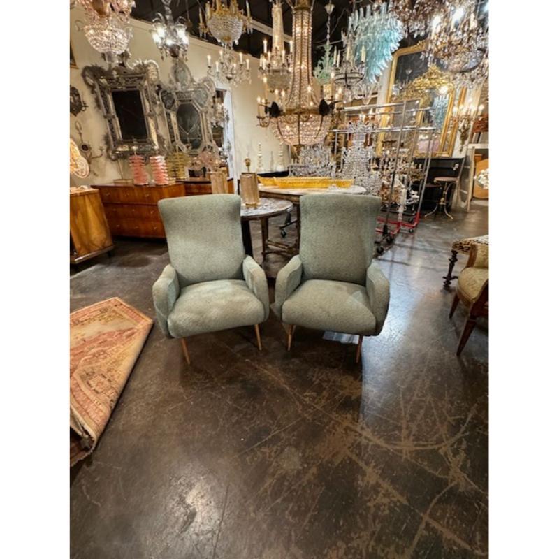 Great pair of Italian mid century upholstered arm chairs after Marco Zanuso. Circa 1970. A fine addition to any home! 36