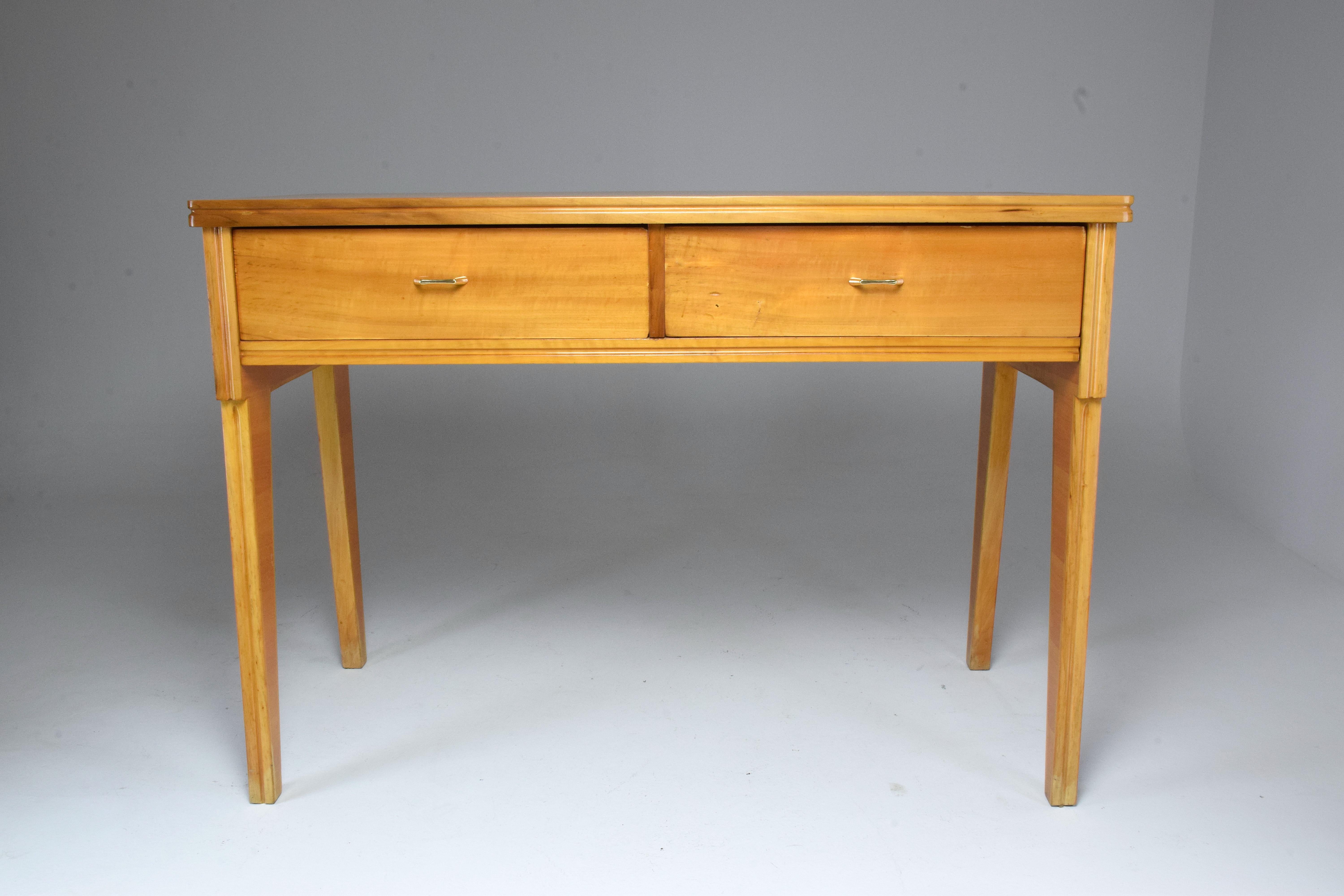 20th century vintage Italian desk or vanity in the style of Ico Parisi composed of a restored cherrywood structure with compass legs and comprised of two drawers sizes 14 x 50 cm with stylish brass handles.

Italy, circa 1950s-1960s.
____
All our