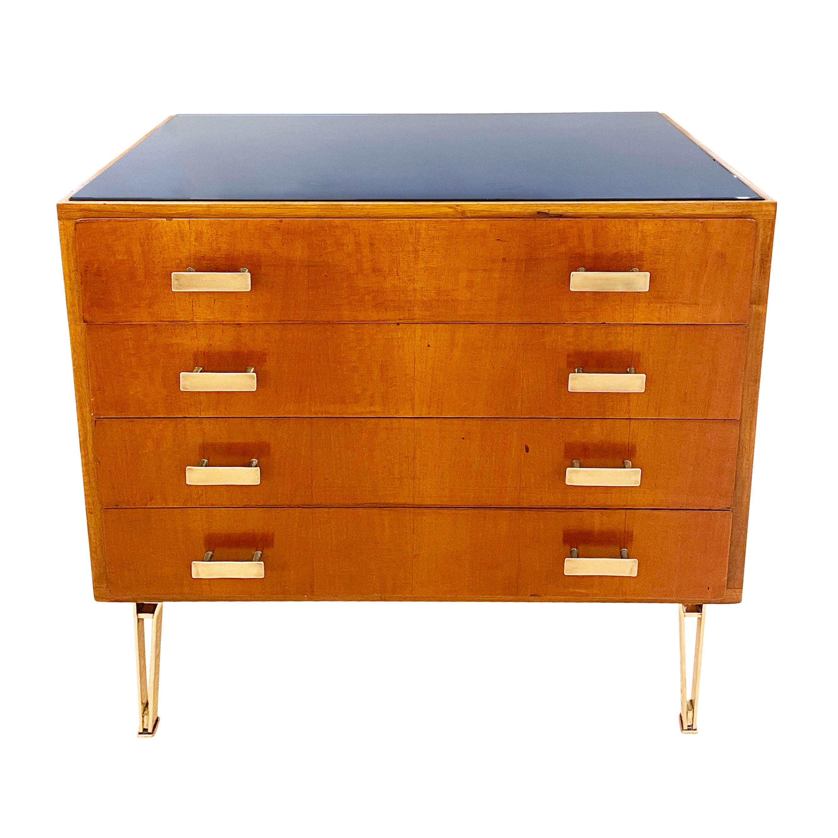Italian Mid-Century wood chest with brass hardware and a blue glass top.

Condition: Excellent vintage condition, minor wear consistent with age and use

Measures: Width: 29.25”

Depth: 19”

Hight: 34.25”

 