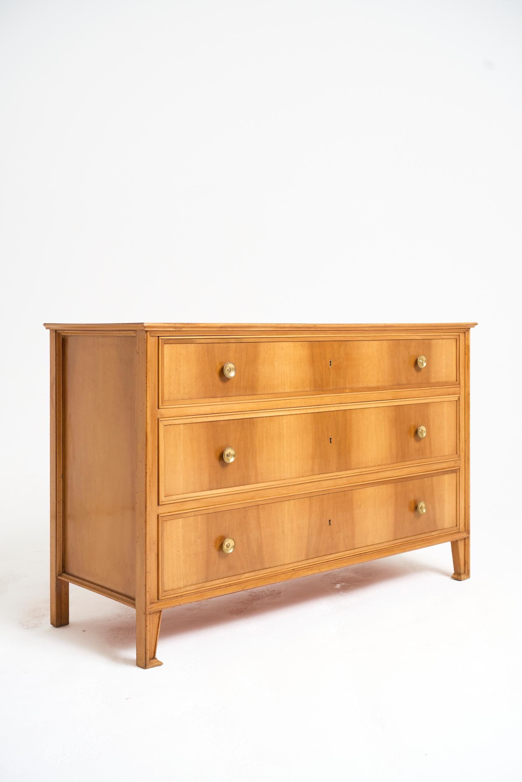 A large walnut chest of drawers
Italy, Circa 1950
