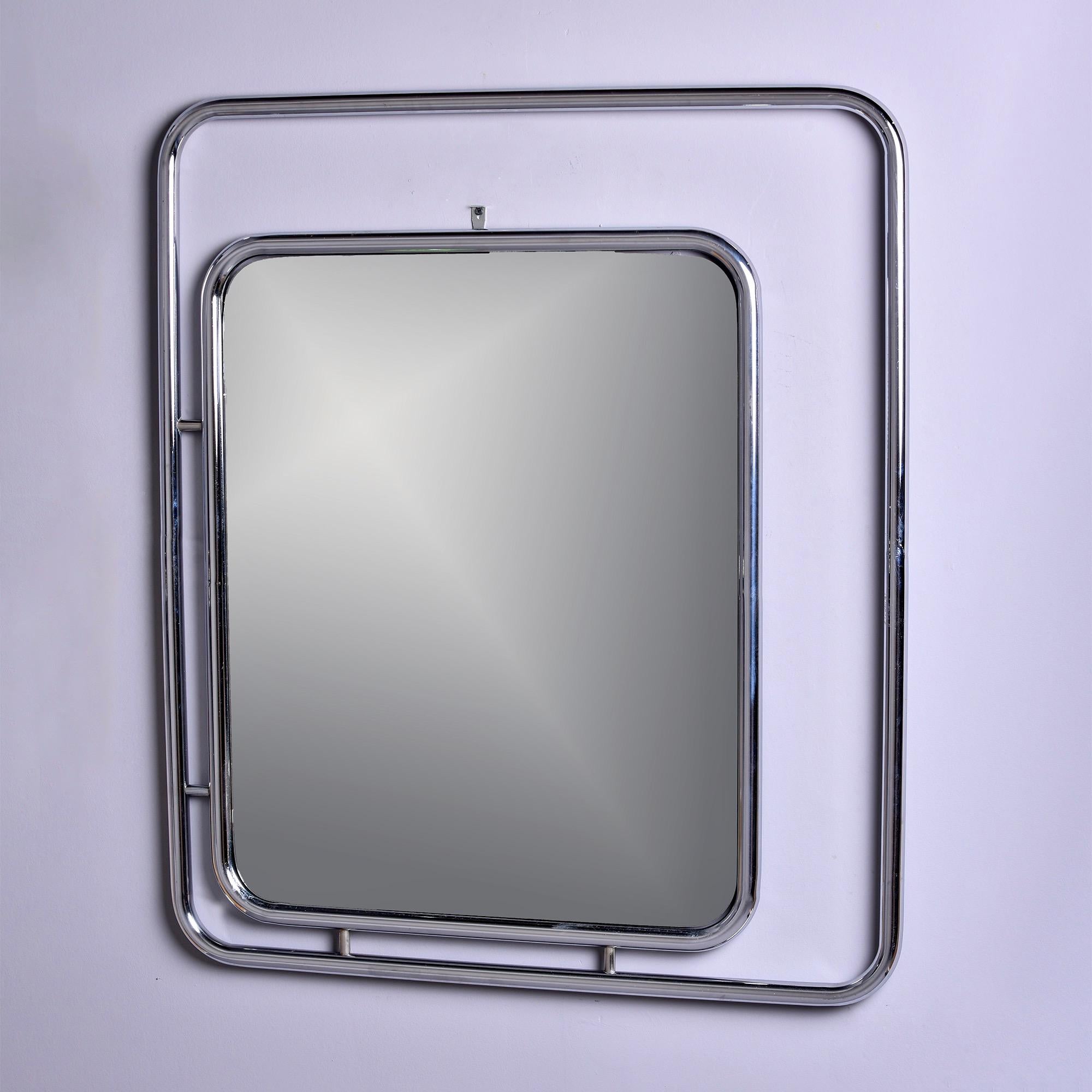 Circa 1970s mirror with chrome tubing frame within a frame. Found in Italy. Unknown maker. Very good vintage condition.

Actual Mirror Size: 28” H x 22.25” W.