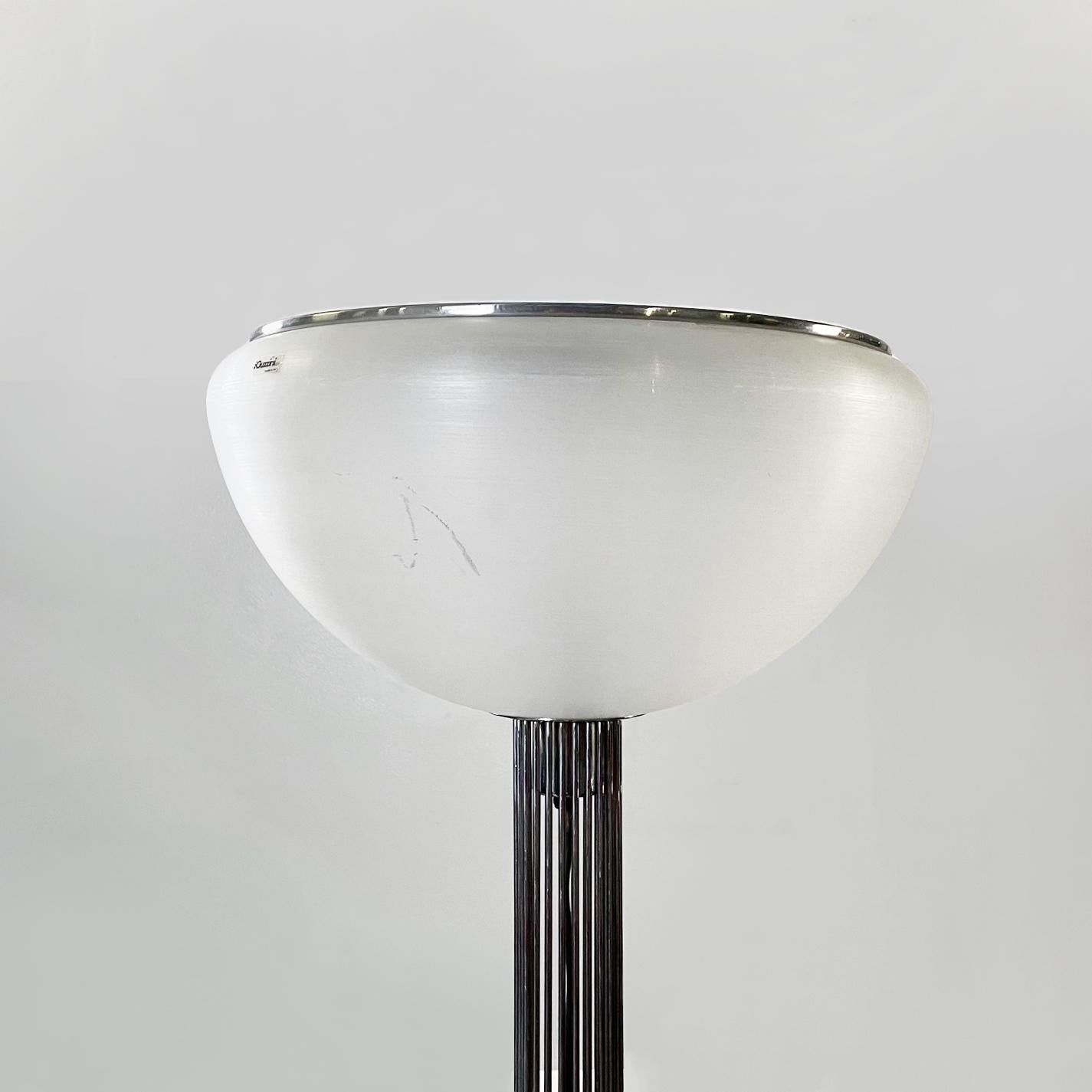 Italian mid-century chromed steel Moana floor lamp by Massoni for iGuzzini, 1960s.
Moana floor lamp with round base and tubular structure in chromed steel and lampshade in matt white plastic.
Produced by iGuzzini in 1960s and designed by Luigi