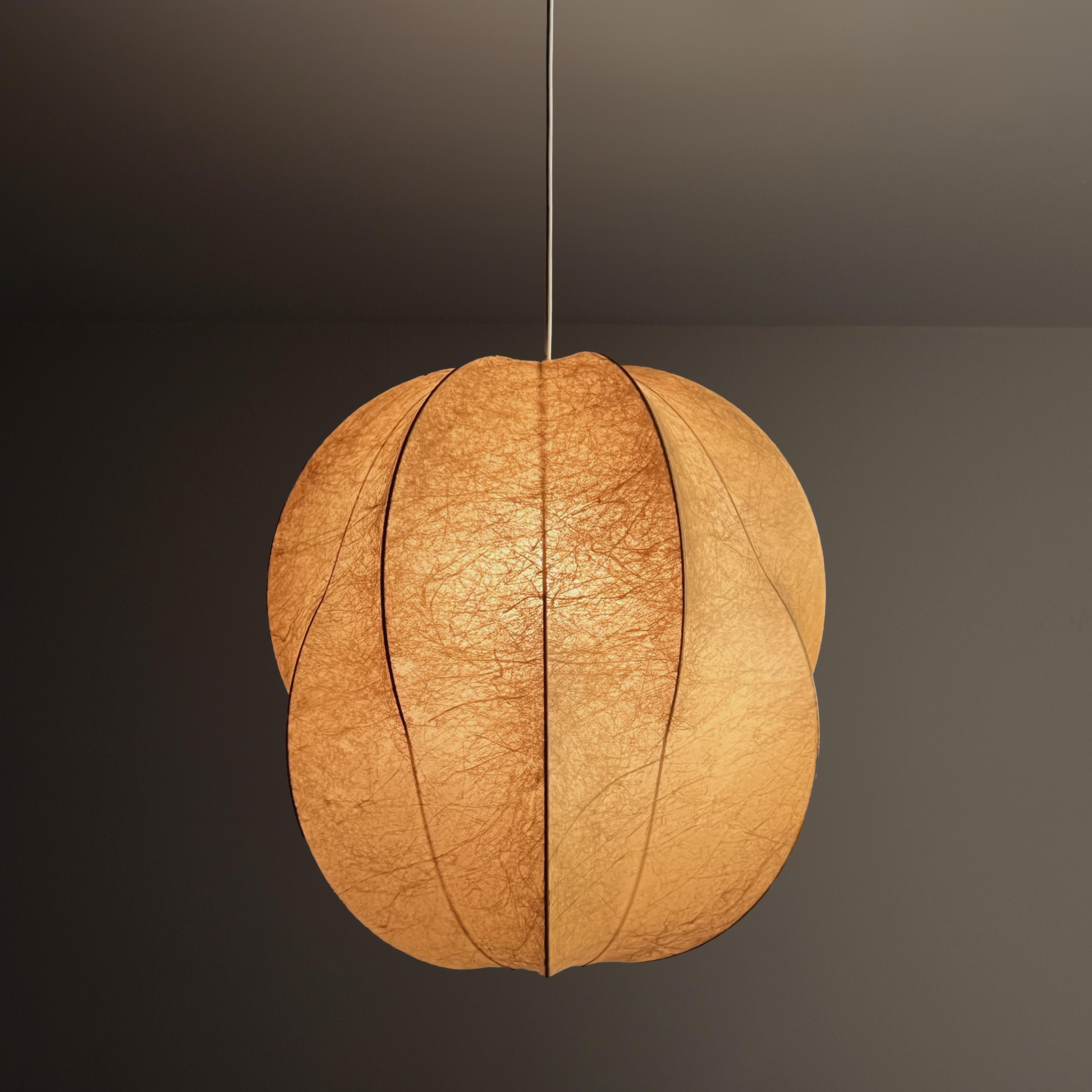 Sculptural Mid-Century Italian Cocoon Pendant Light with beautiful organic shape, Italy 1960s. Behold the captivating allure of the Mid-Century Cocoon Pendant Light. This exquisite luminary boasts a breathtakingly organic silhouette that transports