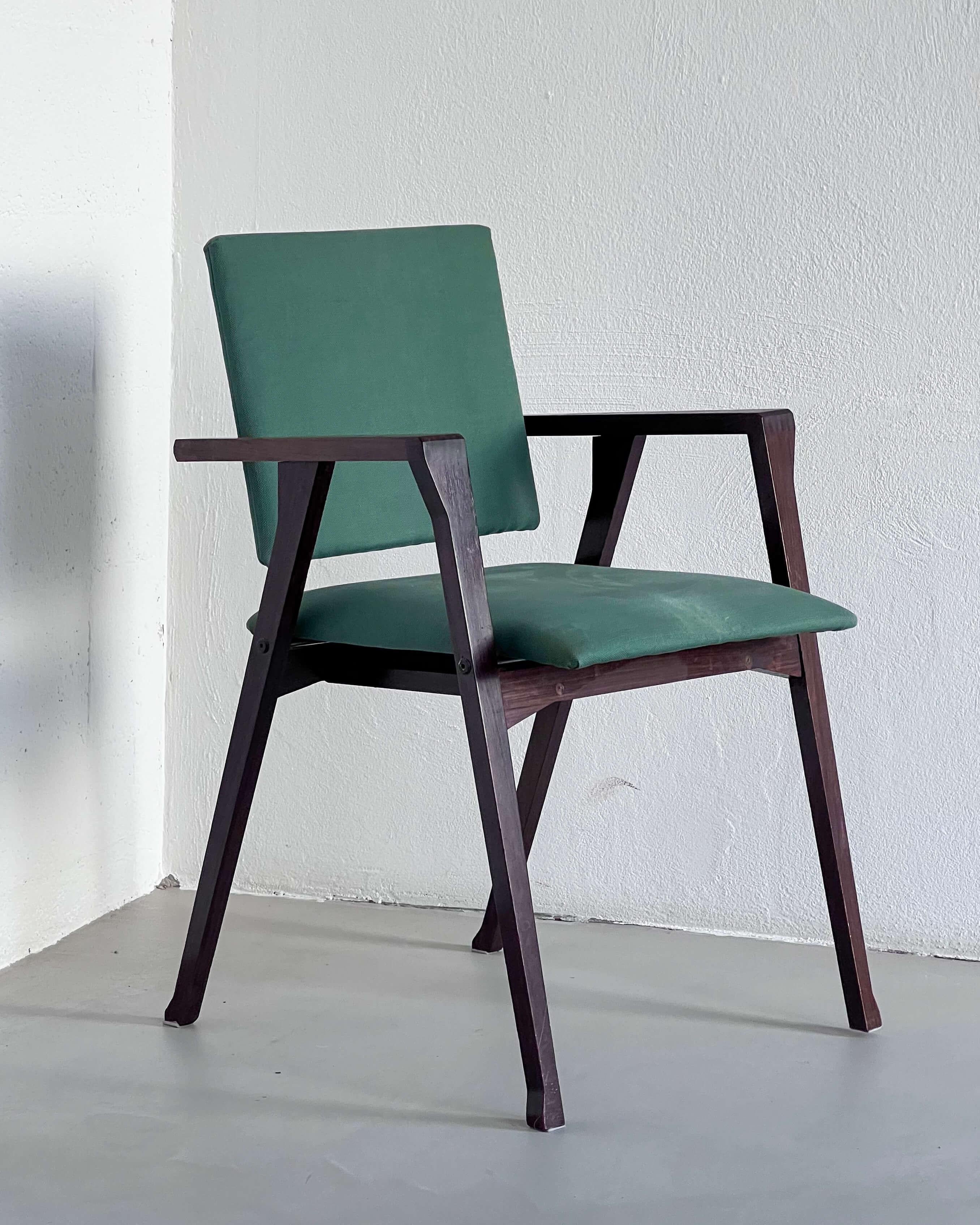 Vintage Italian Mid-Century Modern “Luisa” dining chair, designed by architect Franco Albini for Poggi, with walnut frame and original sage green fabric upholstery.

Franco Albini will be probably known to most for his countless designs. With his