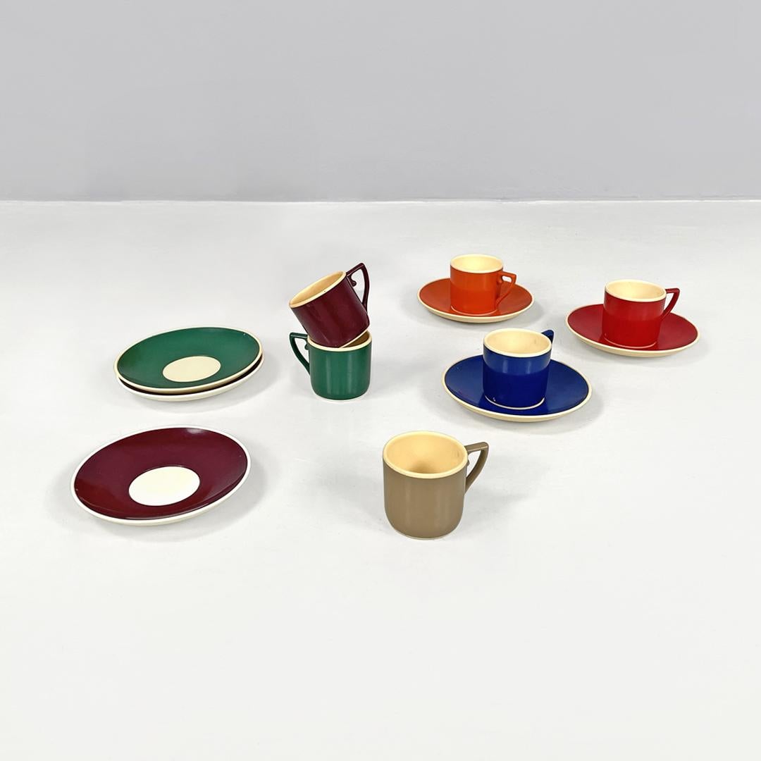 Italian mid-century colored plastic cups and saucers by Kartell Samco, 1960s
Set of six cups and saucers with round base in colored plastic. The cups have a curved handle, the outside is colored and the inside is white, as are the saucers. The