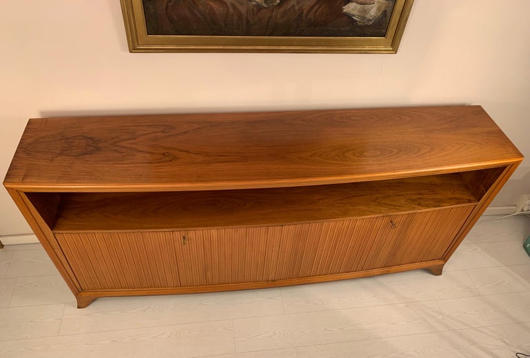 Wood Italian Mid Century Convex Sideboard with Four Grooved Doors For Sale