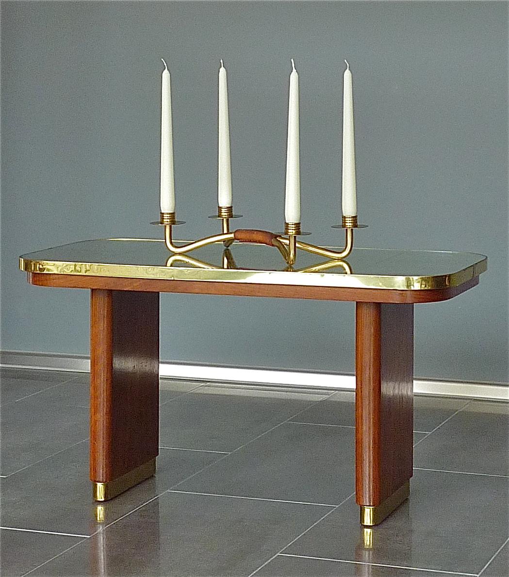 Gorgeous couch / side /  sofa / end table made in wood, veneered walnut, beautiful patinated brass details to feet and table rim, mirror glass as top, very in the style of Fontana Arte and Gio Ponti, Italy, 1957 stamped on wood under the mirror