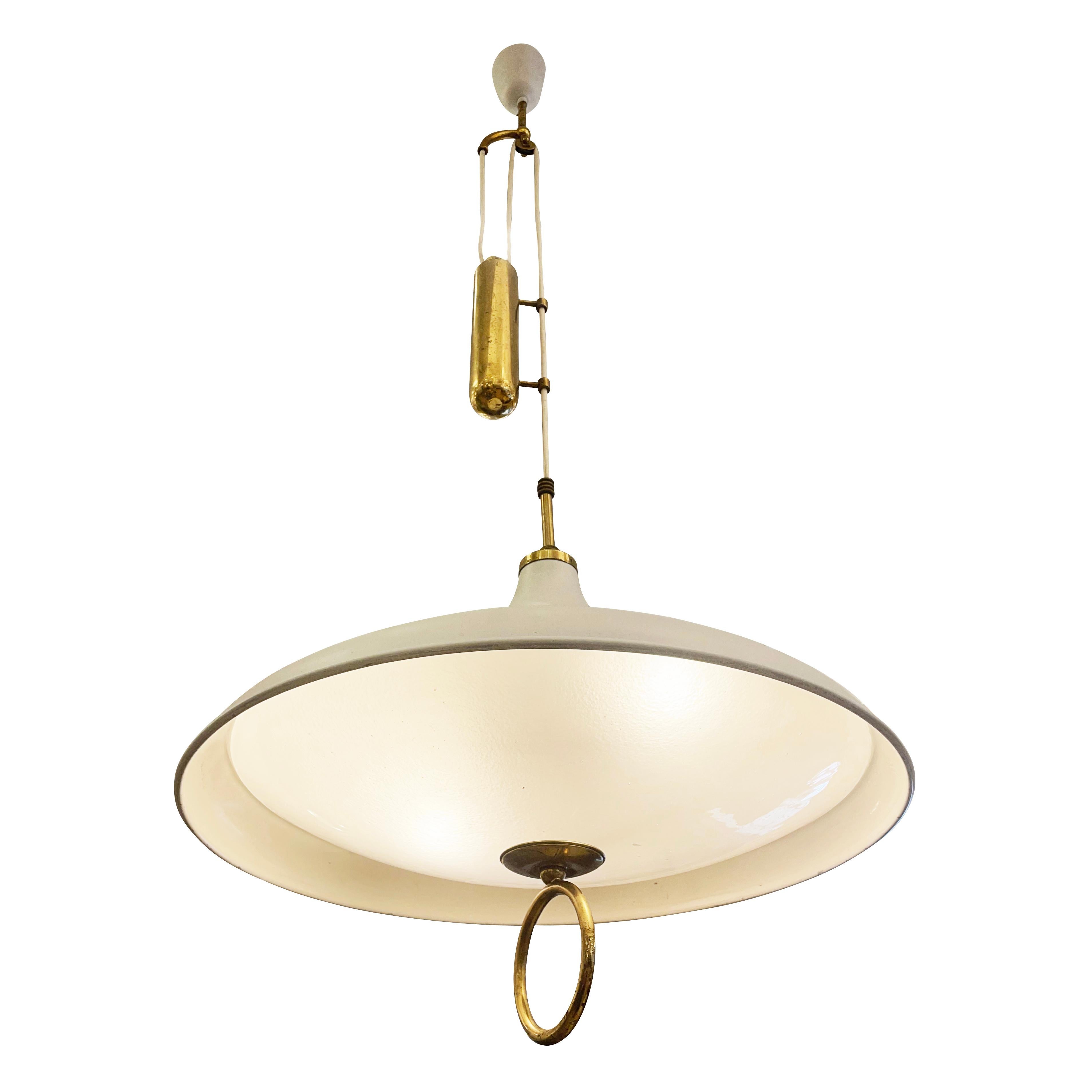 Italian mid-century pendant with an elegant counter weight mechanism which allows for the drop to be easily adjusted. The shade has a white lacquered hood, Murano glass shade and brass handle. Holds two candelabra bulbs.

Condition: Excellent