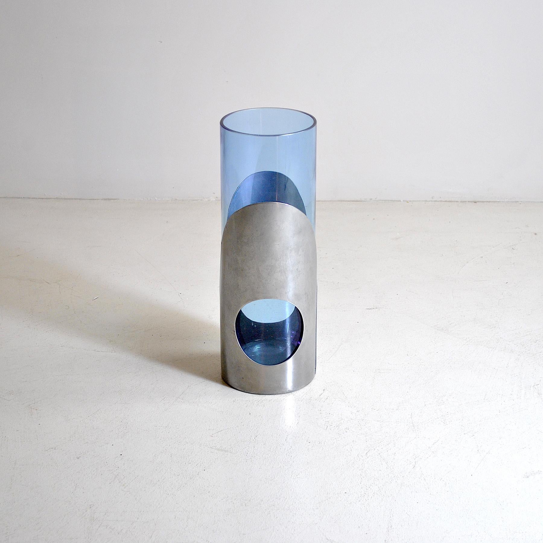 A cylindrical vase late 1960s in bluette glass and steel coating Space Age.