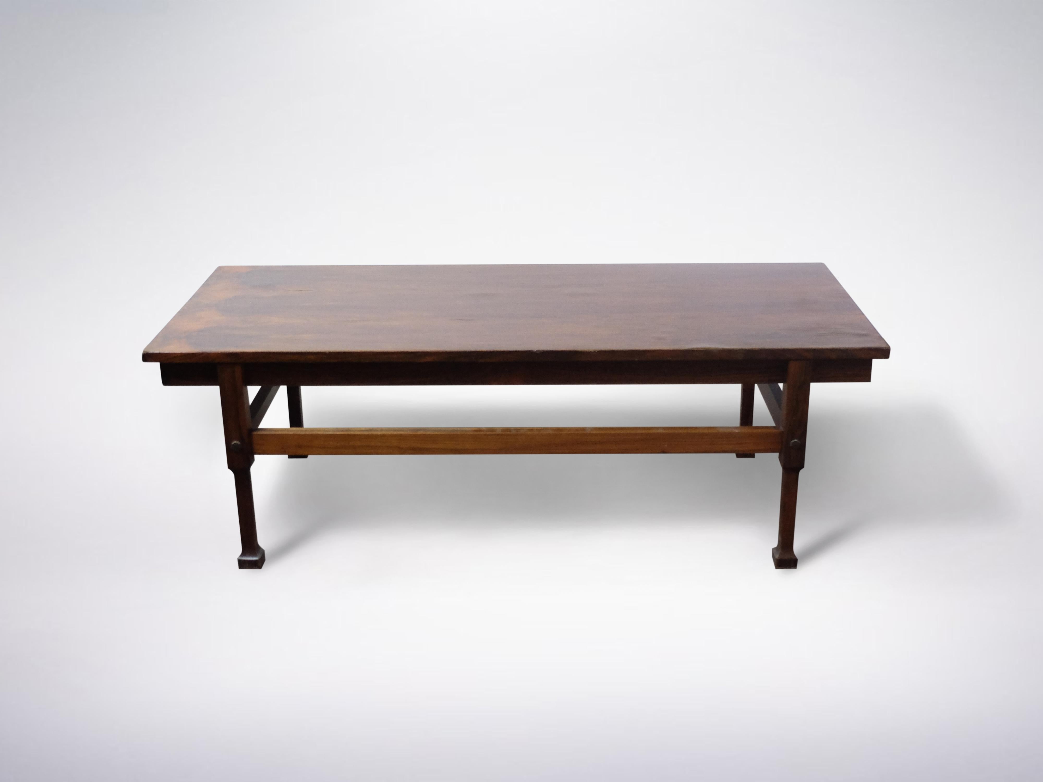 Italian mid-century dark wood coffee table 1950s
Mid century incredible wooden coffee table with a warm dark colour. Extremely sturdy and functional design. The clean lines of the dark wood design are to fall in love with. This coffee table has a