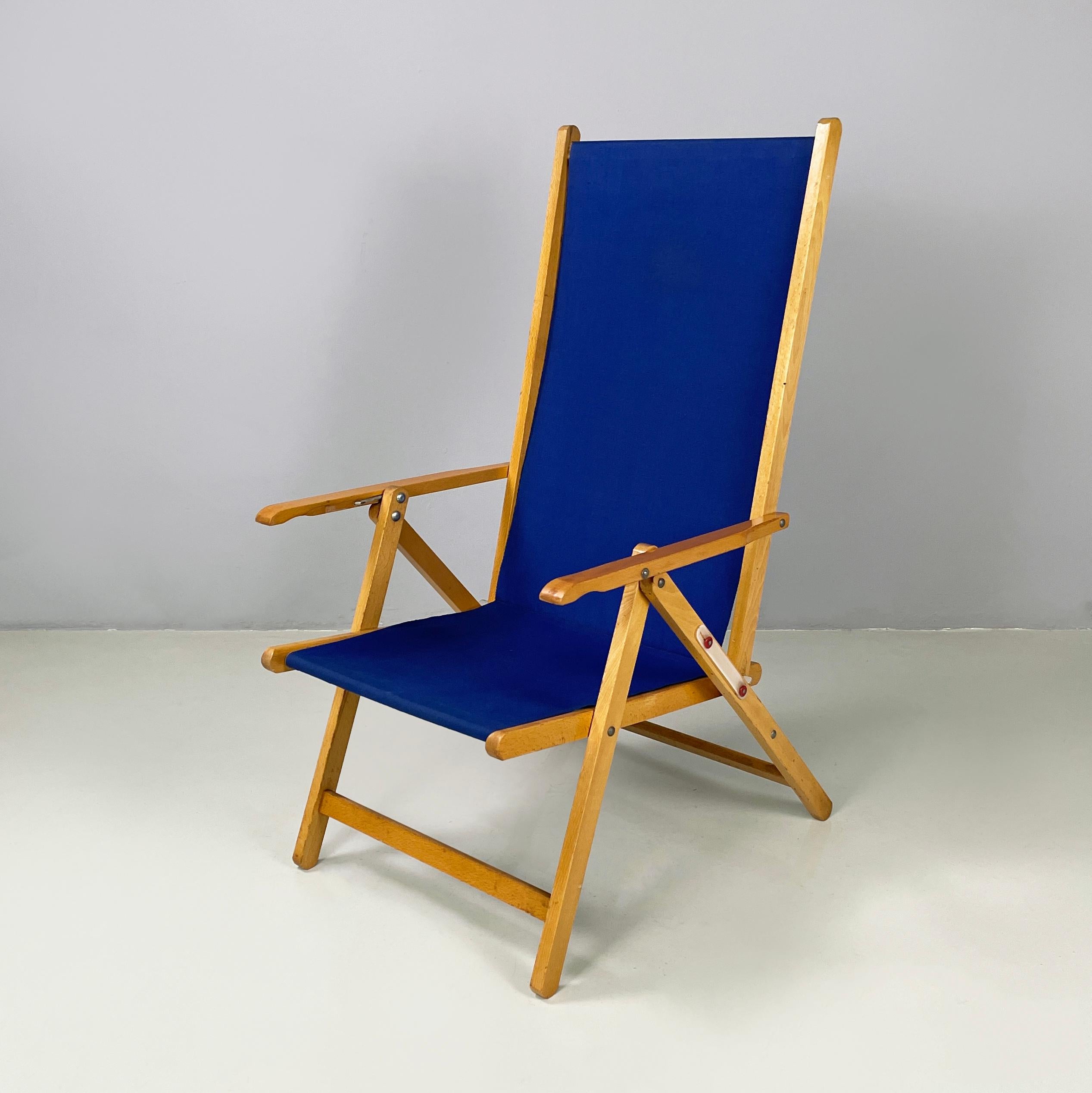 Chaise de terrasse italienne moderne du milieu du siècle en tissu bleu et bois par Fratelli Reguitti, années 1960
Chaise longue avec assise en tissu bleu. Le dossier a deux types d'inclinaison grâce à un mécanisme métallique situé sur les
