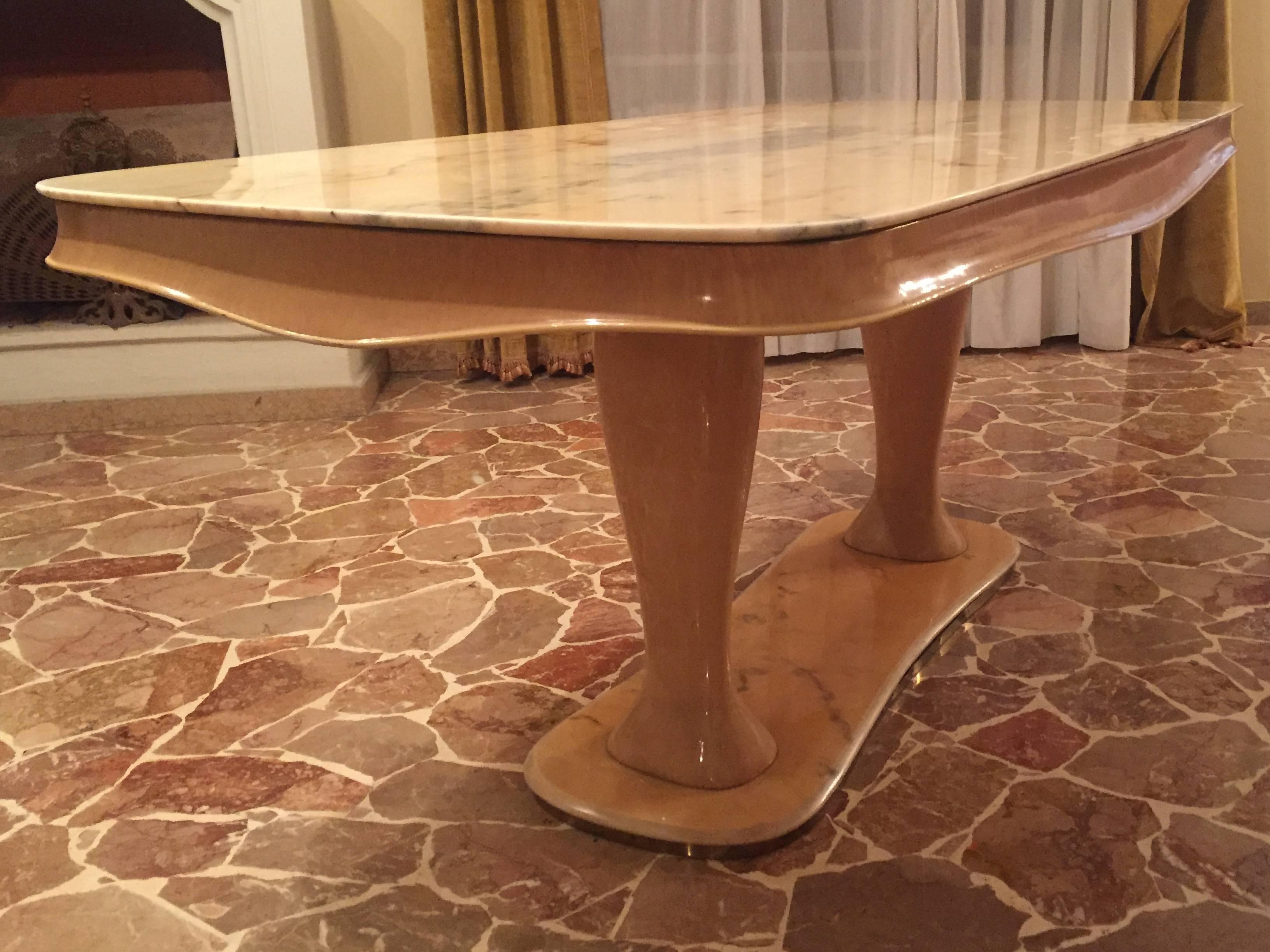 Beautiful Italian dining table, elegant base line, table top in Portugal marble.