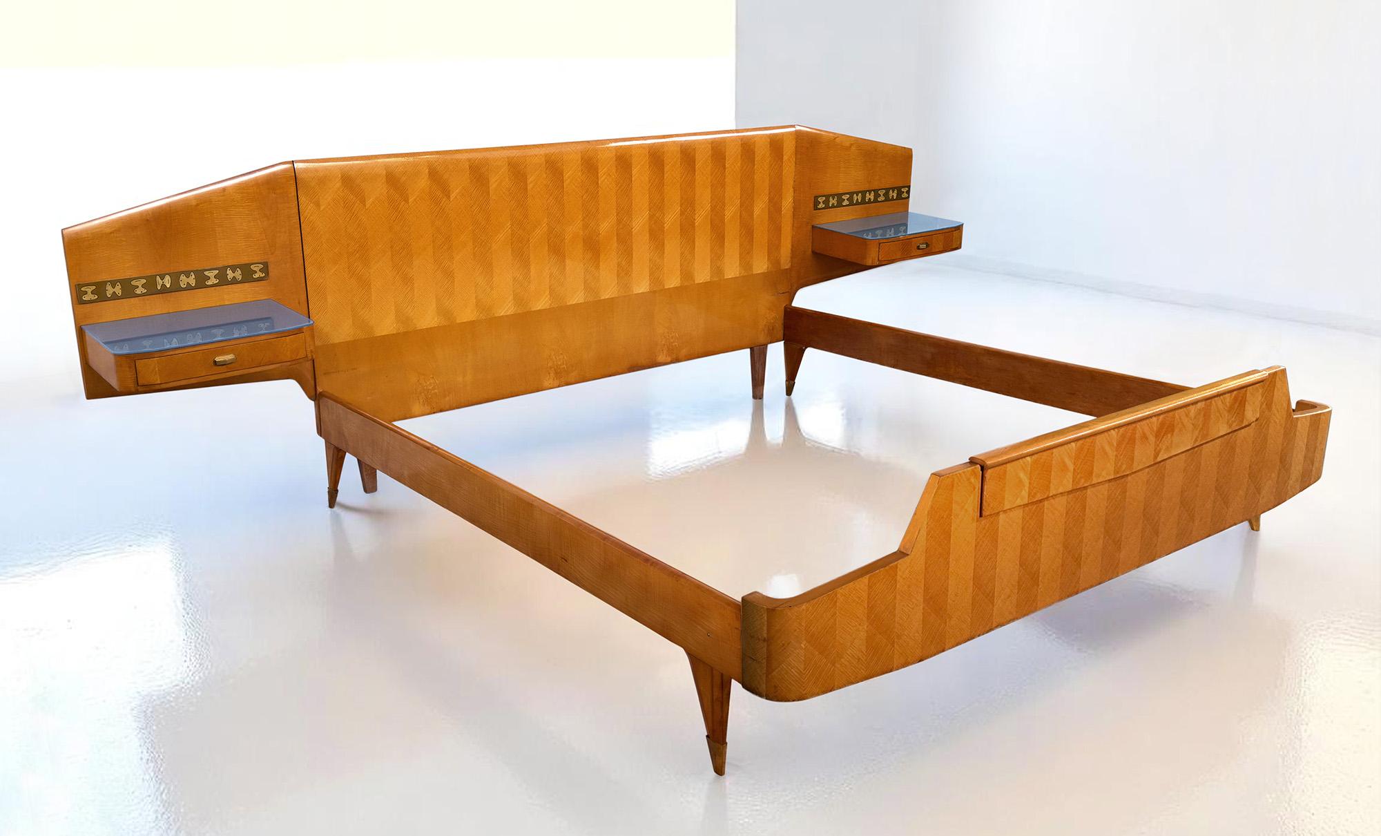 This so well designed double bed flanked by two floating nightstands, is part of a rare and complete mid-century bedroom suite — which also includes a stunning vanity dresser with mirror (coming soon) and a magnificent six-door mirrored wardrobe