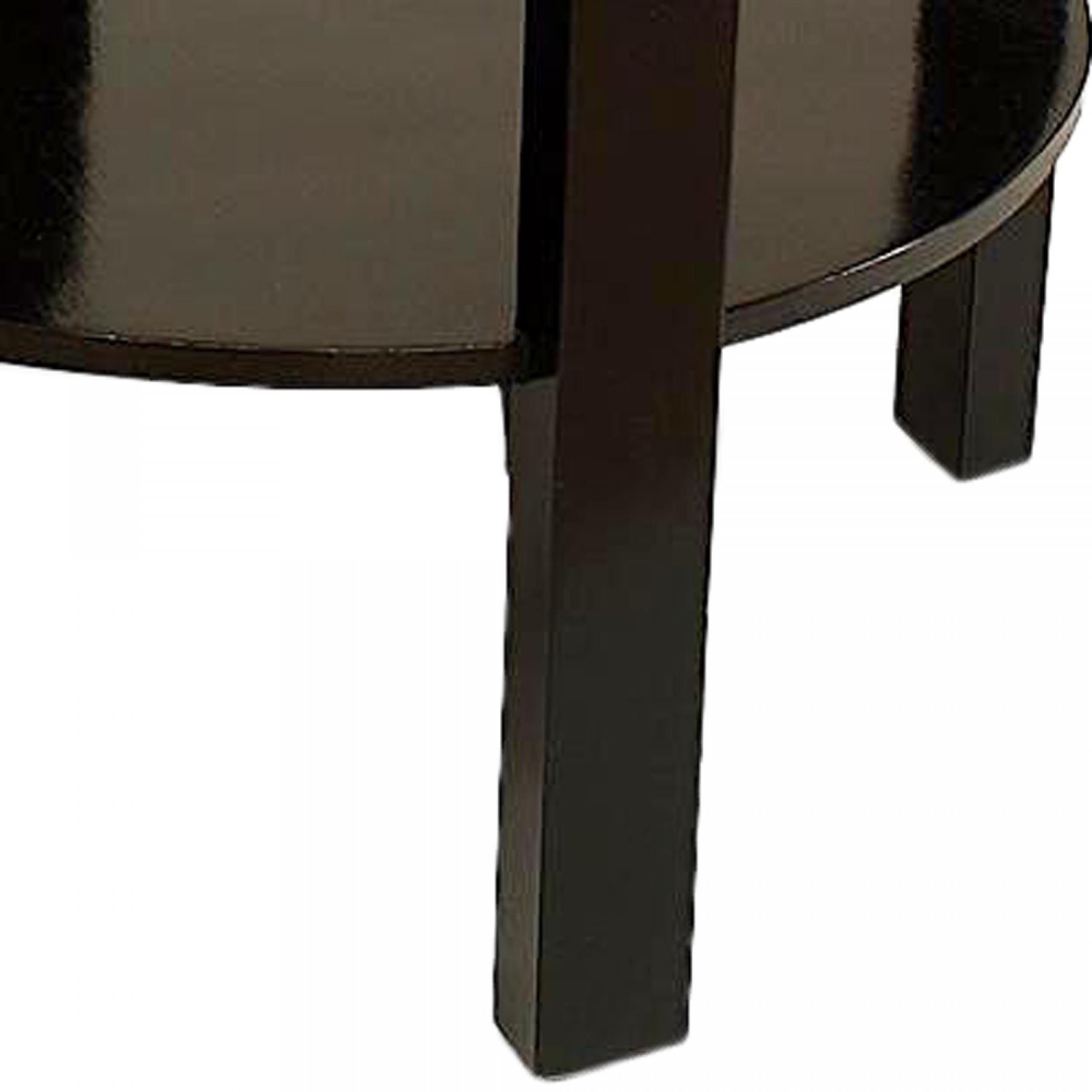 Italian Mid-Century (1940s) ebonized round table with 4 legs and shelf stretcher