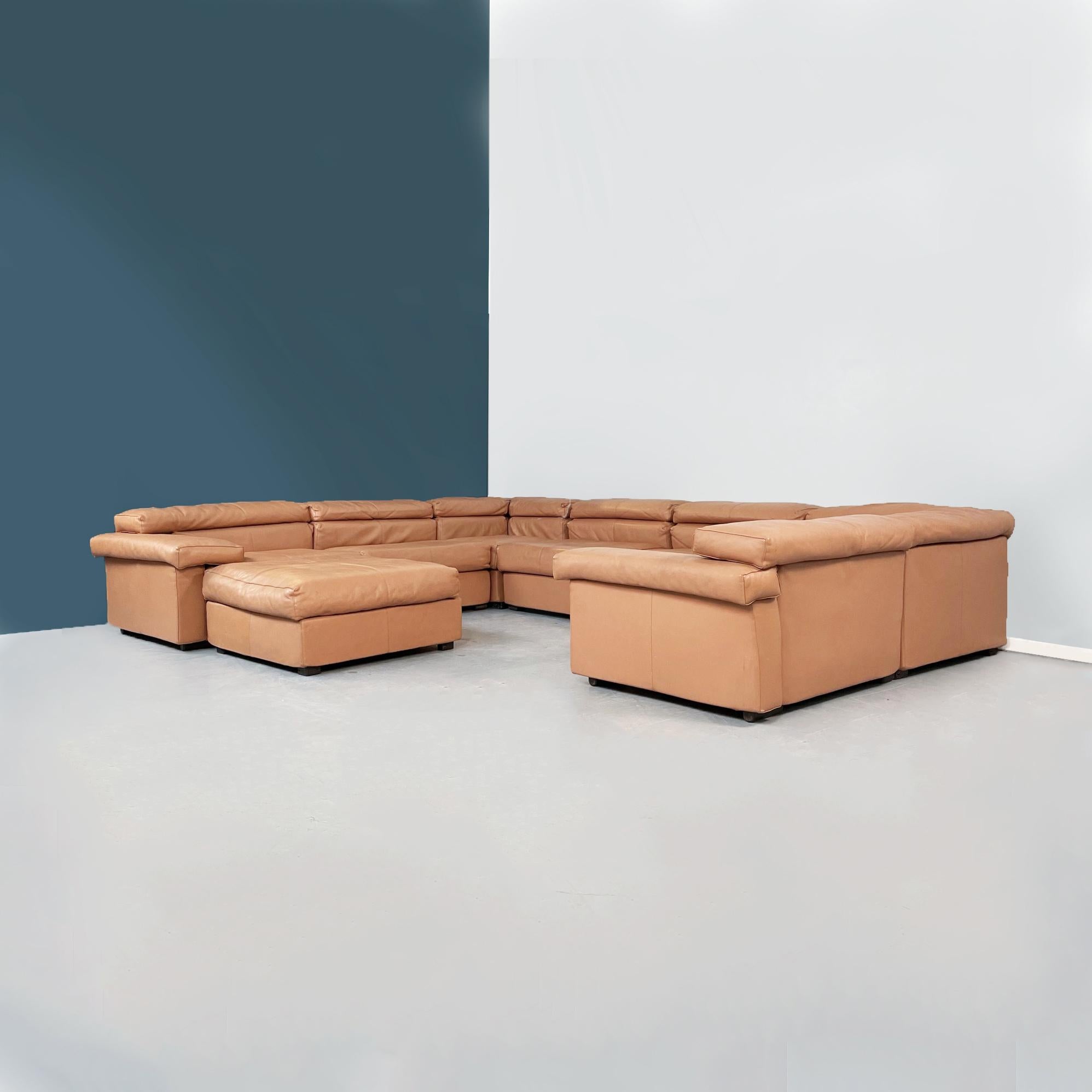 Italian mid-century Erasmo brown leather Sofa by Afra and Tobia Scarpa for B&B, 1980s.
Erasmo corner sofa in light brown leather. The modules that compose it are 3 central, 2 corners, two with armrests and a pouf. The modulars are interchangeabl.