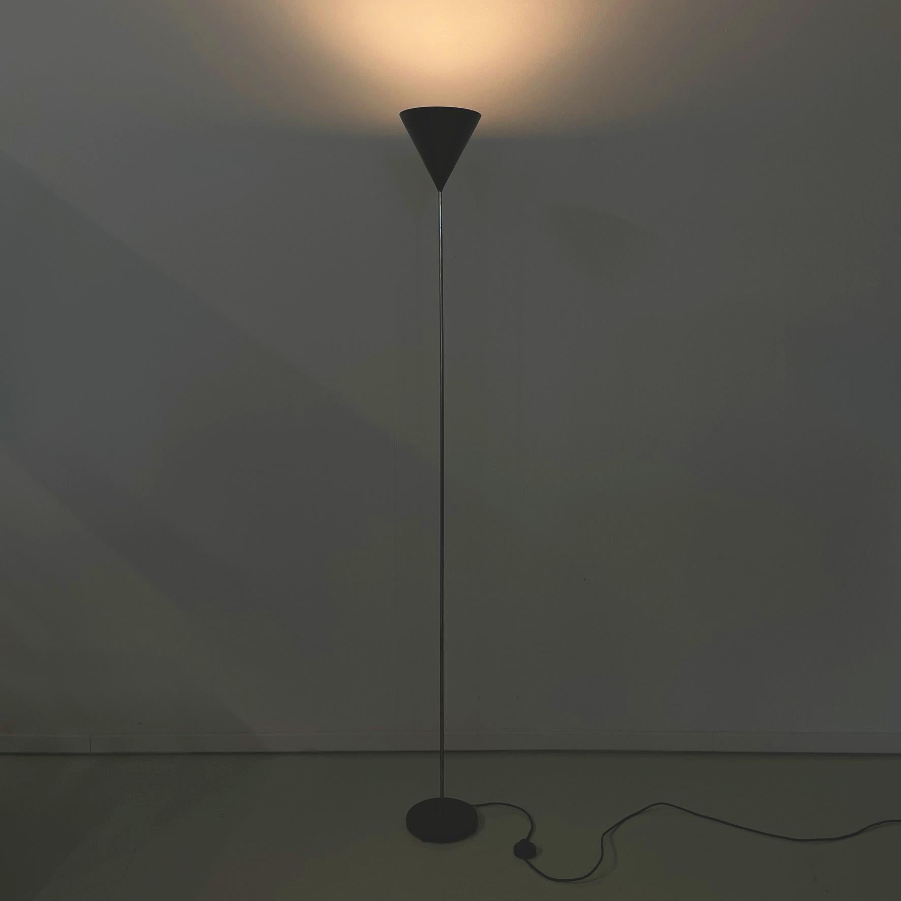 Italian midcentury floor lamp Imbuto by Luigi Caccia Dominioni for Azucena, 1960s
Iconic floor lamp mod. Imbuto (Funnel) with conical lampshade in dark brown-black painted aluminium. The central structure is made up of a thin chromed metal rod. The