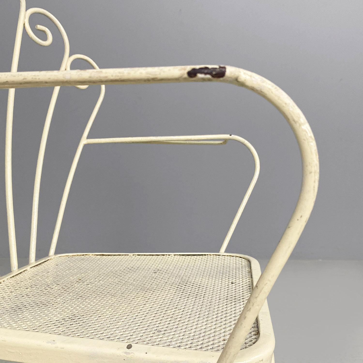 Iron Italian mid-century four white wrought iron outdoor chairs with curls, 1960s For Sale