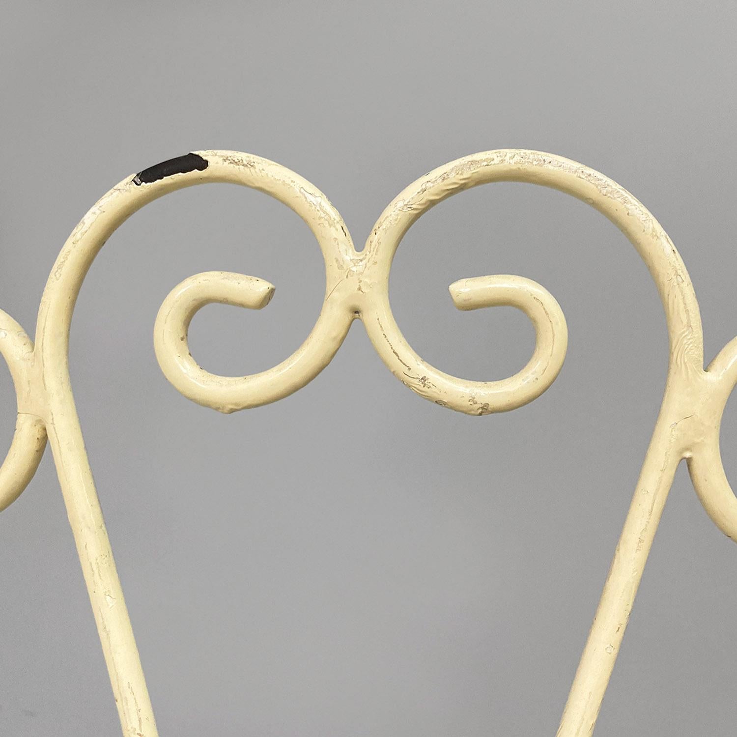 Italian mid-century four white wrought iron outdoor chairs with curls, 1960s For Sale 1