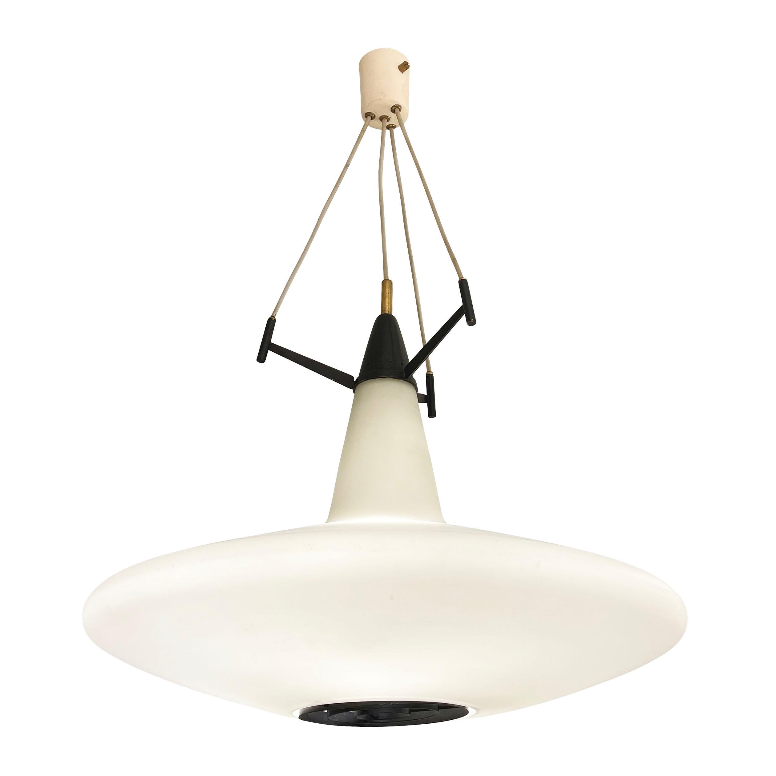 Italian mid-century pendant featuring a beautifully molded frosted glass shade suspended by three adjustable cables. The canopy is off-white while the other hardware pieces are brass and lacquered black. Holds 3 E26 sockets.

Condition: Excellent