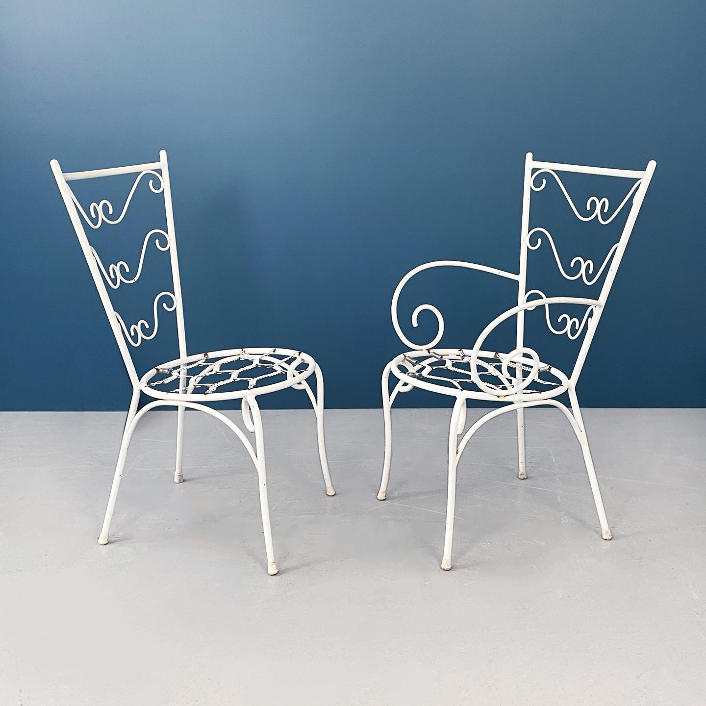 Italian mid-century Garden chairs in white wrought iron and fabric, 1960s.
Garden set consisting of 4 chairs. The outdoor chairs are in white painted wrought iron. The round seat is made up of a series of springs, on which is placed a padded