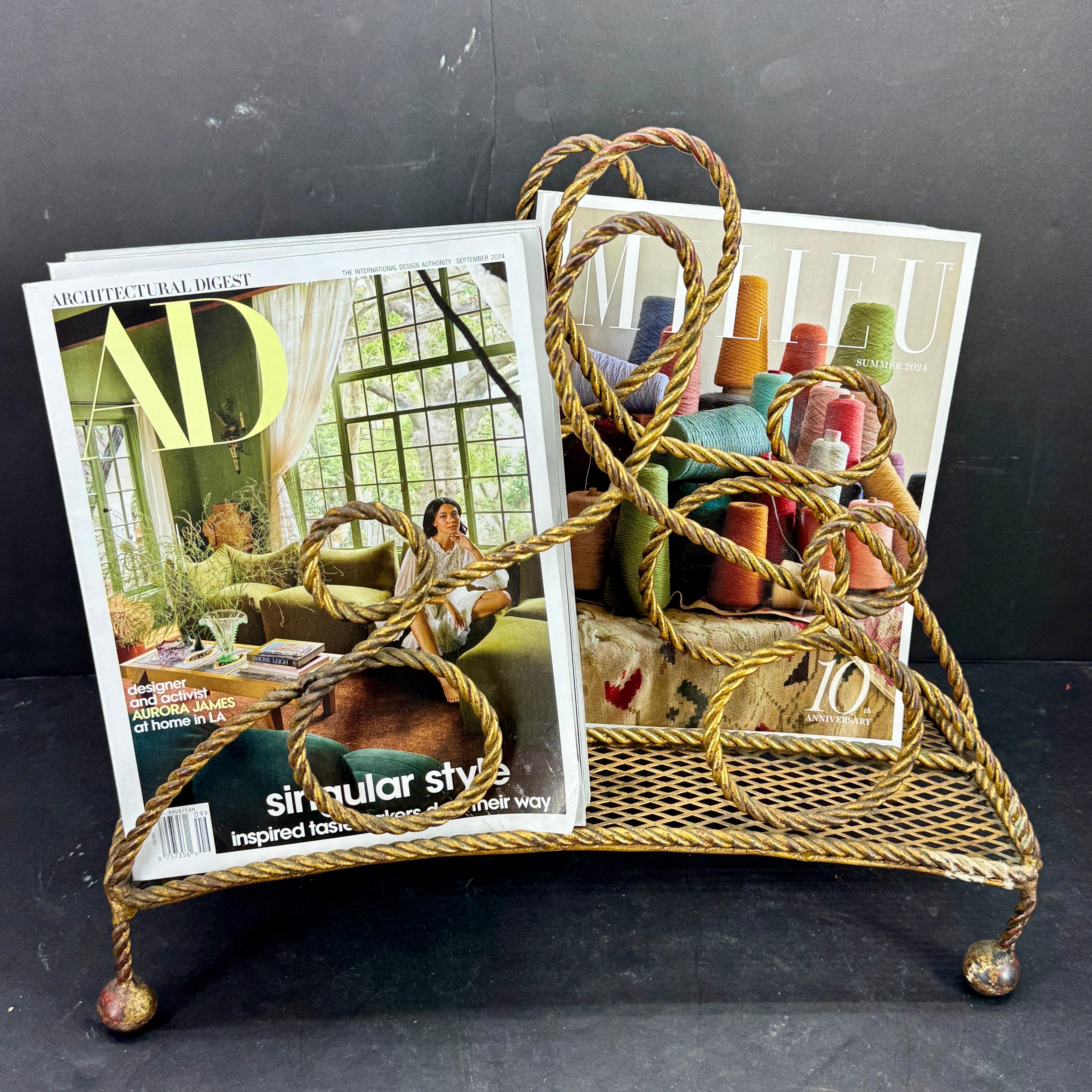 Charming vintage magazine rack from the 1960's. This Mid-Century Modern piece would be a wonderful addition to any living room or guest room in any formal or informal setting. Marked Made in Italy.