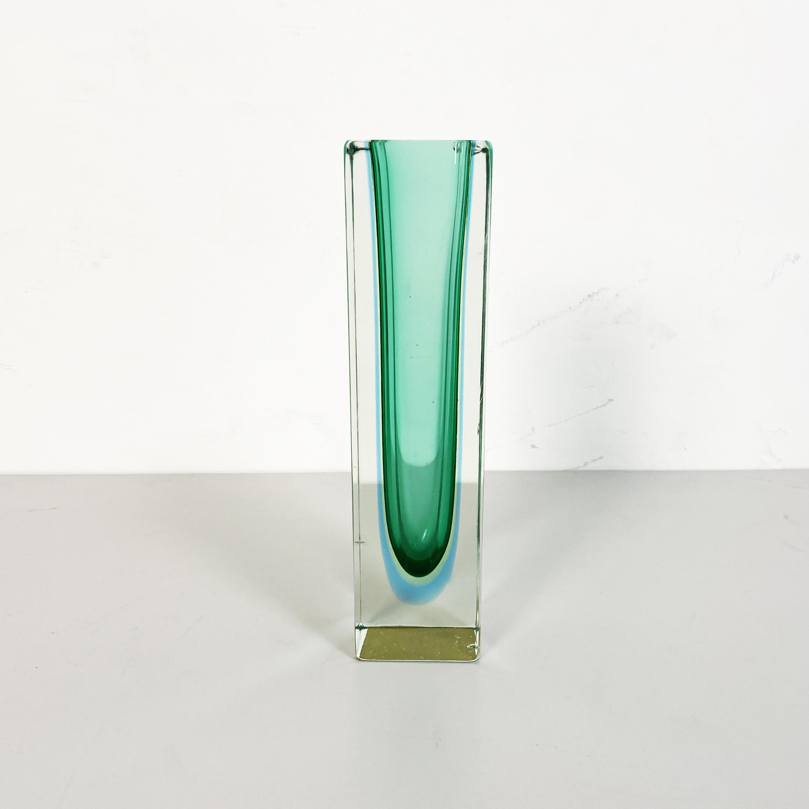 Italian mid-century Green Murano glass vase with internal blue shades, 1970s
Green Murano glass vase with internal blue shade. From the I Sommersi series.
1970s 
This Fantastic series of Murano glass vase with various colored shades, is the 