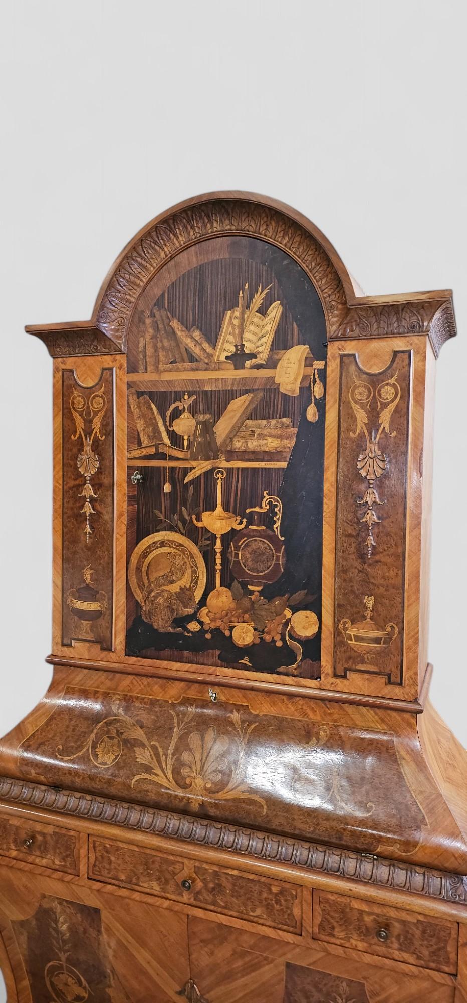 Tall sideboard or Trumeau with Lift (May 1964): The beautiful inlaid decoration, crafted from various essences of natural polychrome woods, appears to be inspired by the Pre-Raphaelite movement. The lift's panel features representations of books,