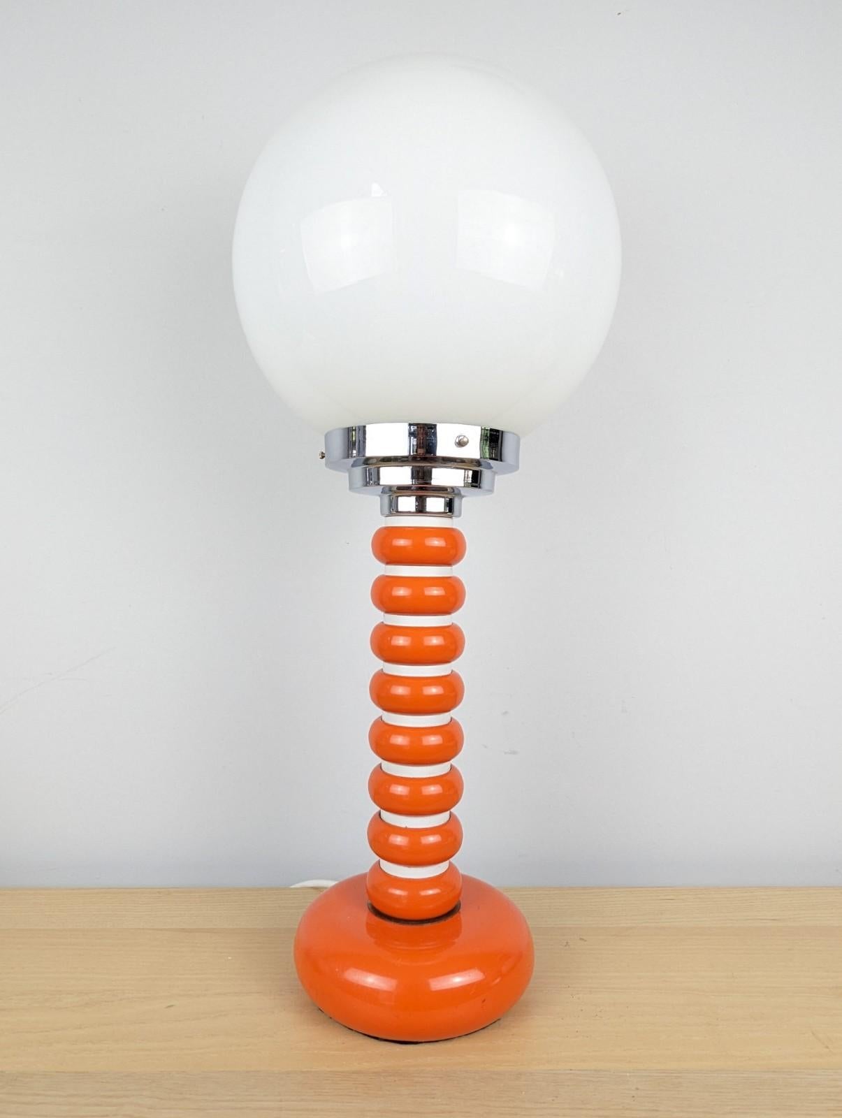 Fabulous Italian mid-century lamp with an opaline lamp shade with an enamel base

The orange and white base is in great condition with strong vibrant colours. Together with the opaline shade which is in fabulous condition will be a great addition to