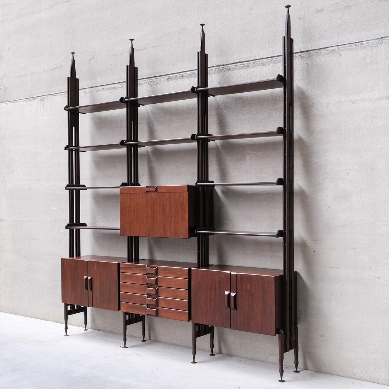 A large display shelving unit. 

Italy, c1960s. 

Good quality, combining form and function. 

Some wear and scuffs commensurate with age but generally good condition. 

Self stands but best attached to the ceiling for support.