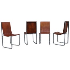 Chaises italiennes du milieu du siècle en cuir cognac structure d'acier design minimaliste 1960