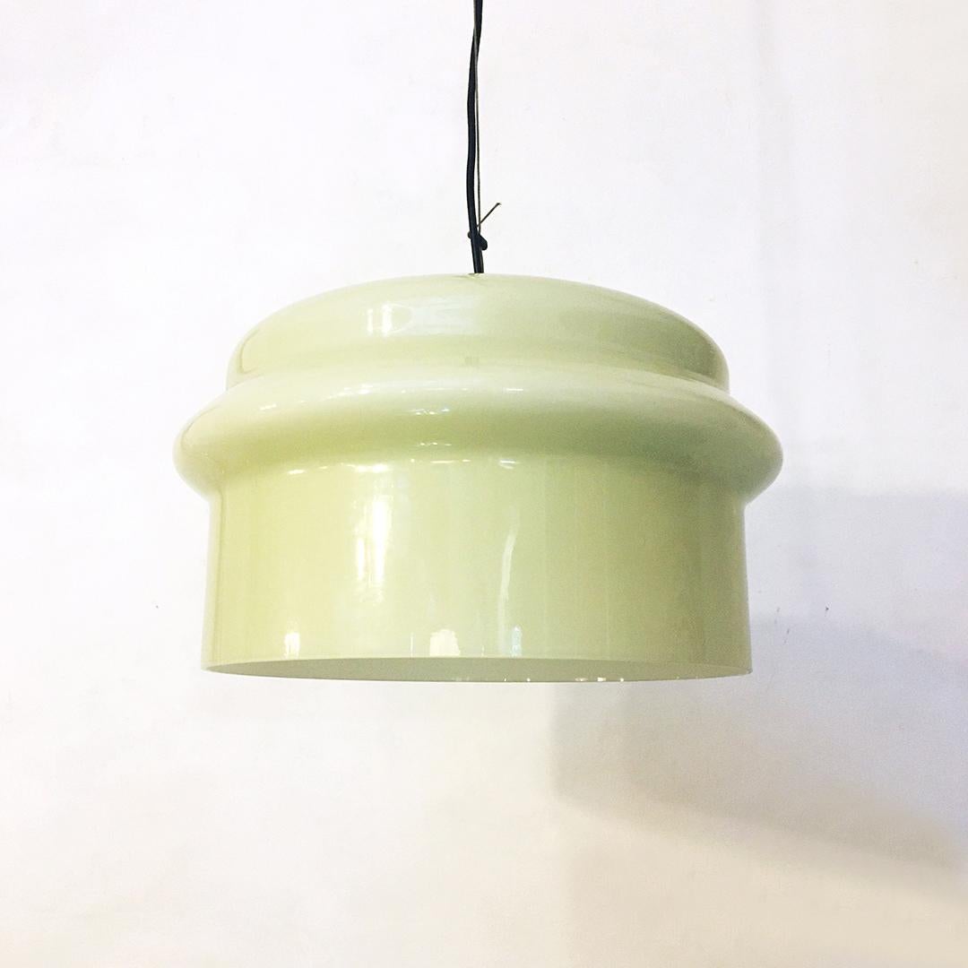 Italian midcentury light green cased glass suspension chandelier, 1950s
light green cased glass chandelier, round section and lamp holder equipped with brass rack for graduated oblique suspension. Diffused light,
circa 1950.
Perfect condition,