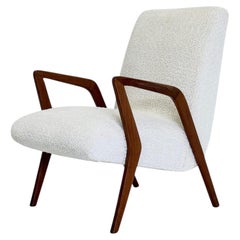Italian mid century lounge armchair in cherry wood with white buckle