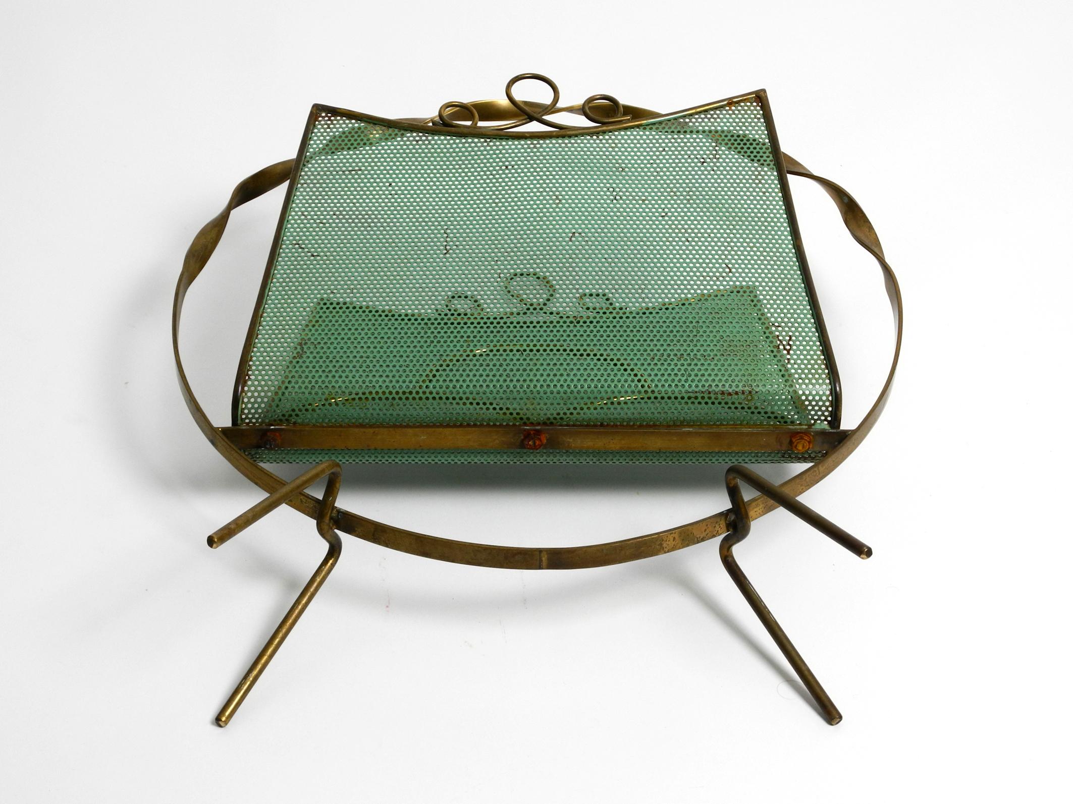 Italian Mid Century magazine rack made of brass and perforated sheet metal For Sale 2