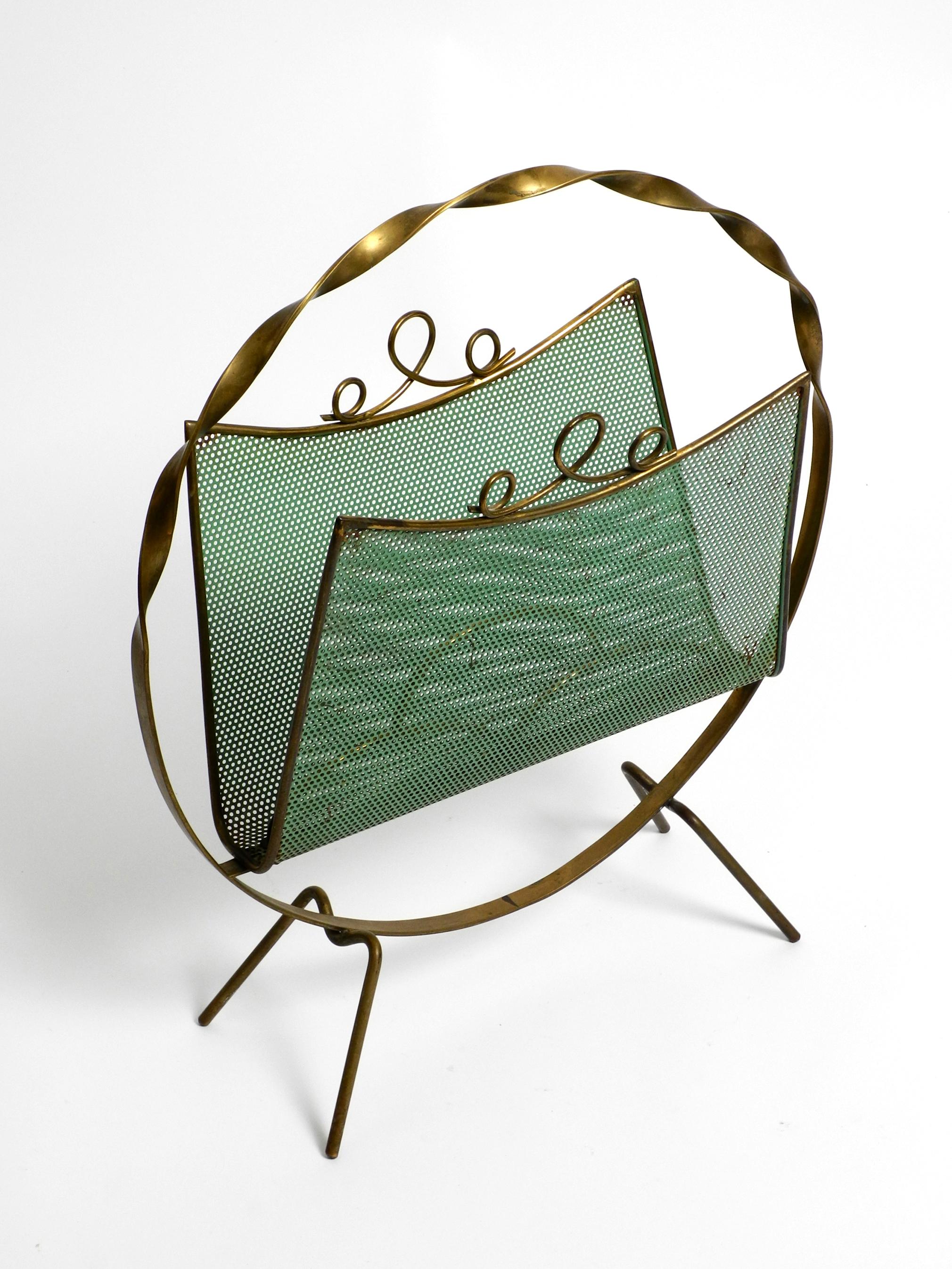 Mid-Century Modern Italian Mid Century magazine rack made of brass and perforated sheet metal For Sale