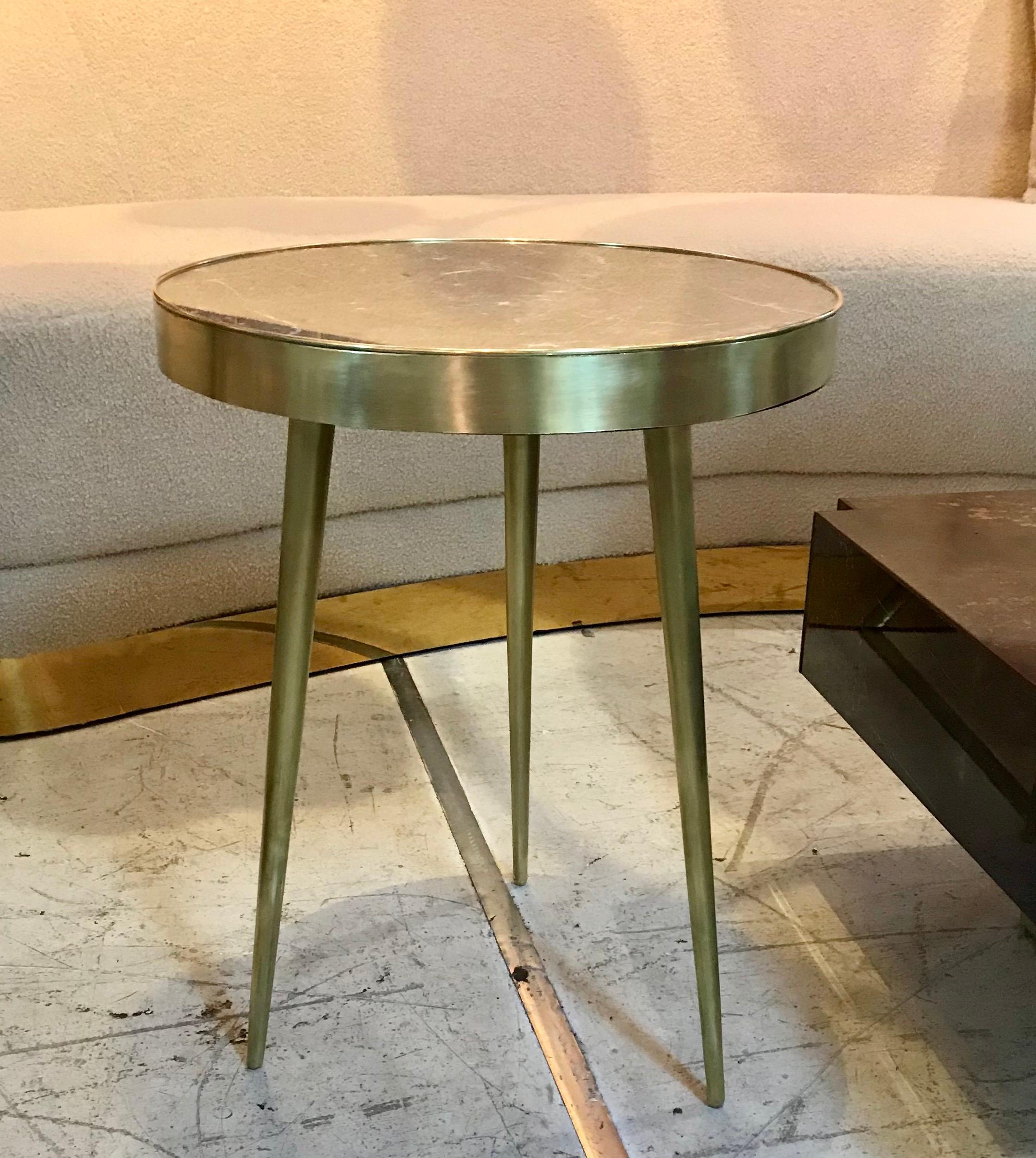 A pair of taupe grey marble topped side tables with tapered brass legs, circa 1960s, Italy.