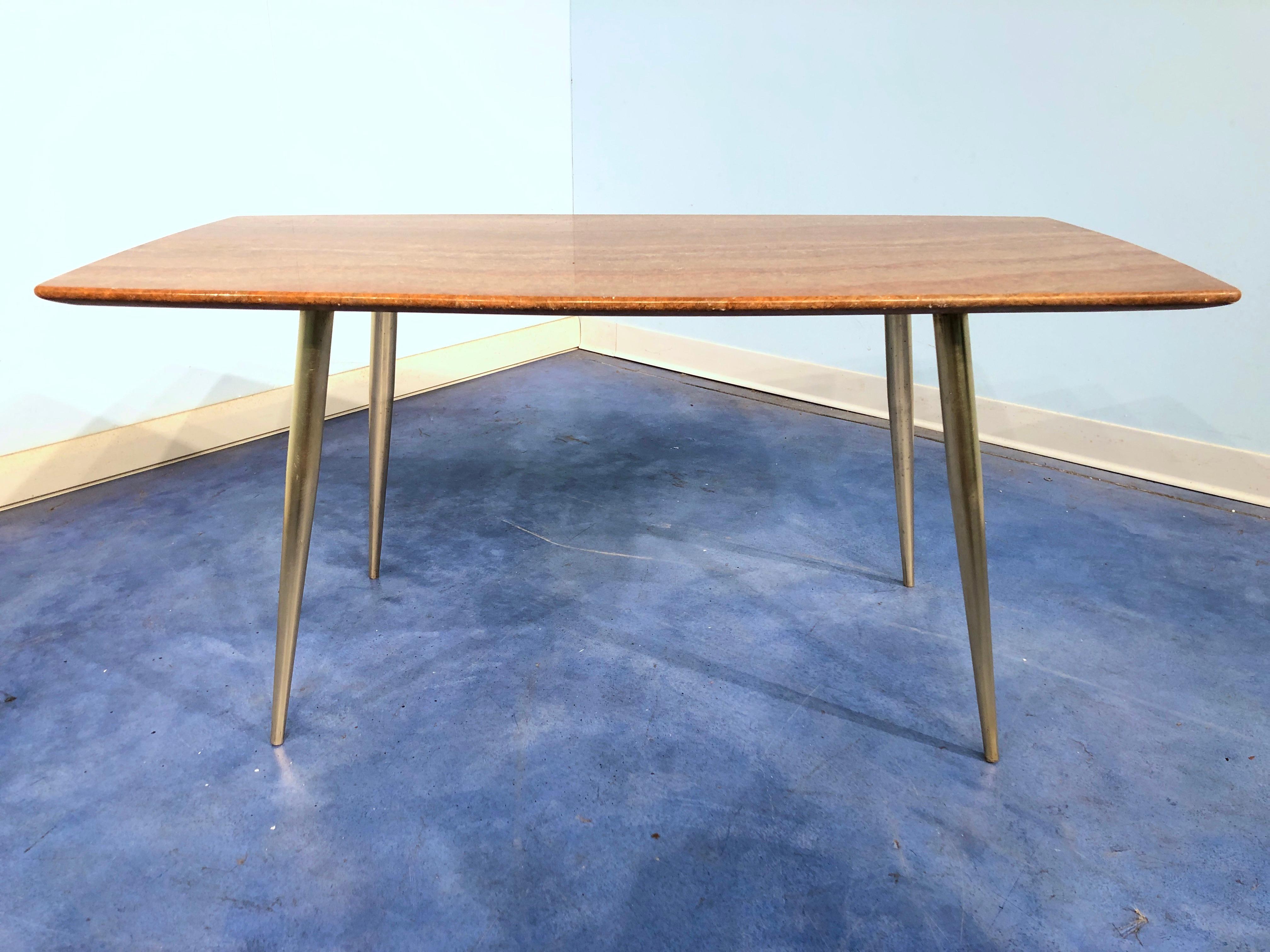 Elegant and stylish Italian midcentury coffee table, with brass legs and unique orange marble color.