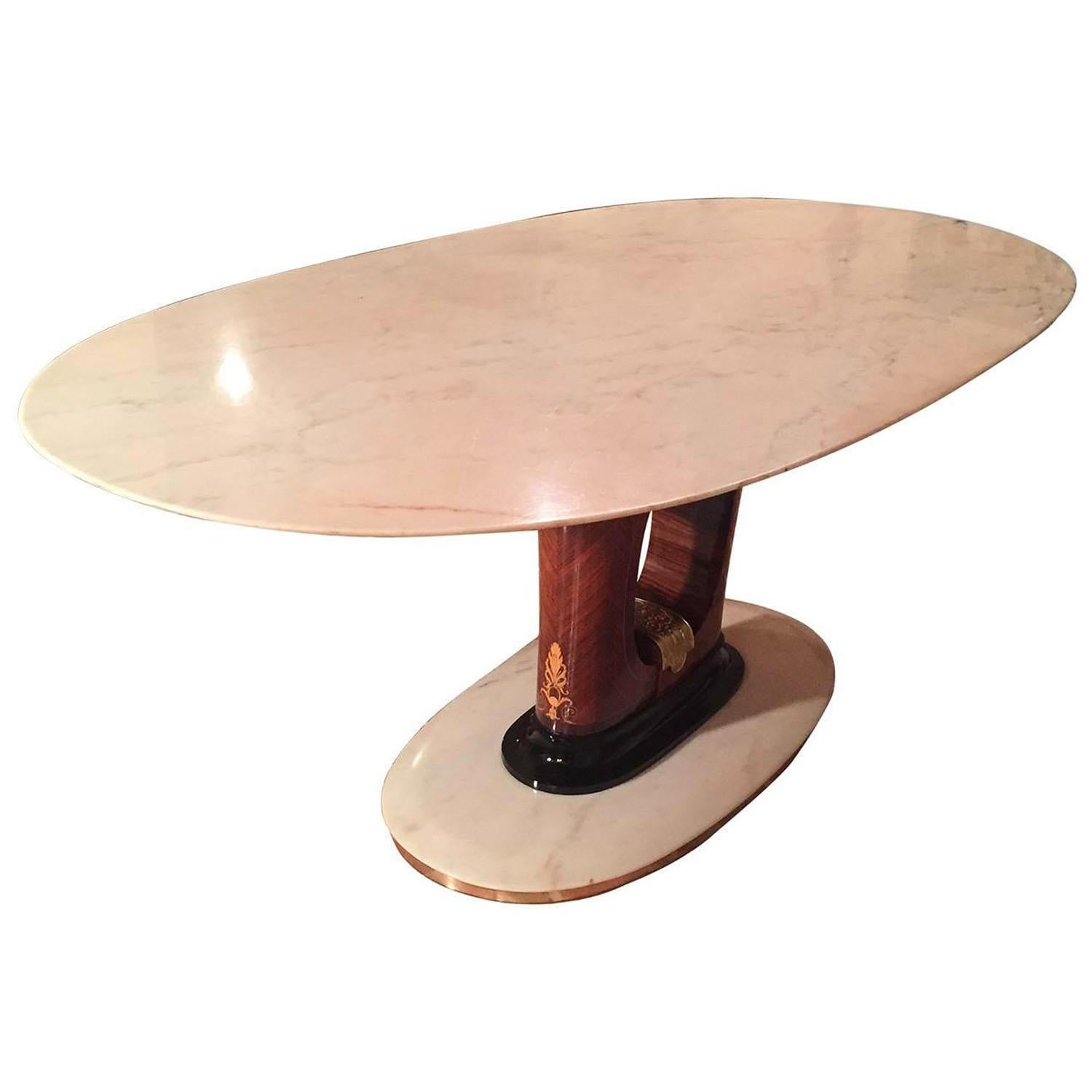 Luxurious Italian marble dining table, superb base line, Carrara marble, completely restored and ready to use.

We can manage the shipping over the world, packing the item with a customized wooden crate. This table will be shipped from Italy. Under