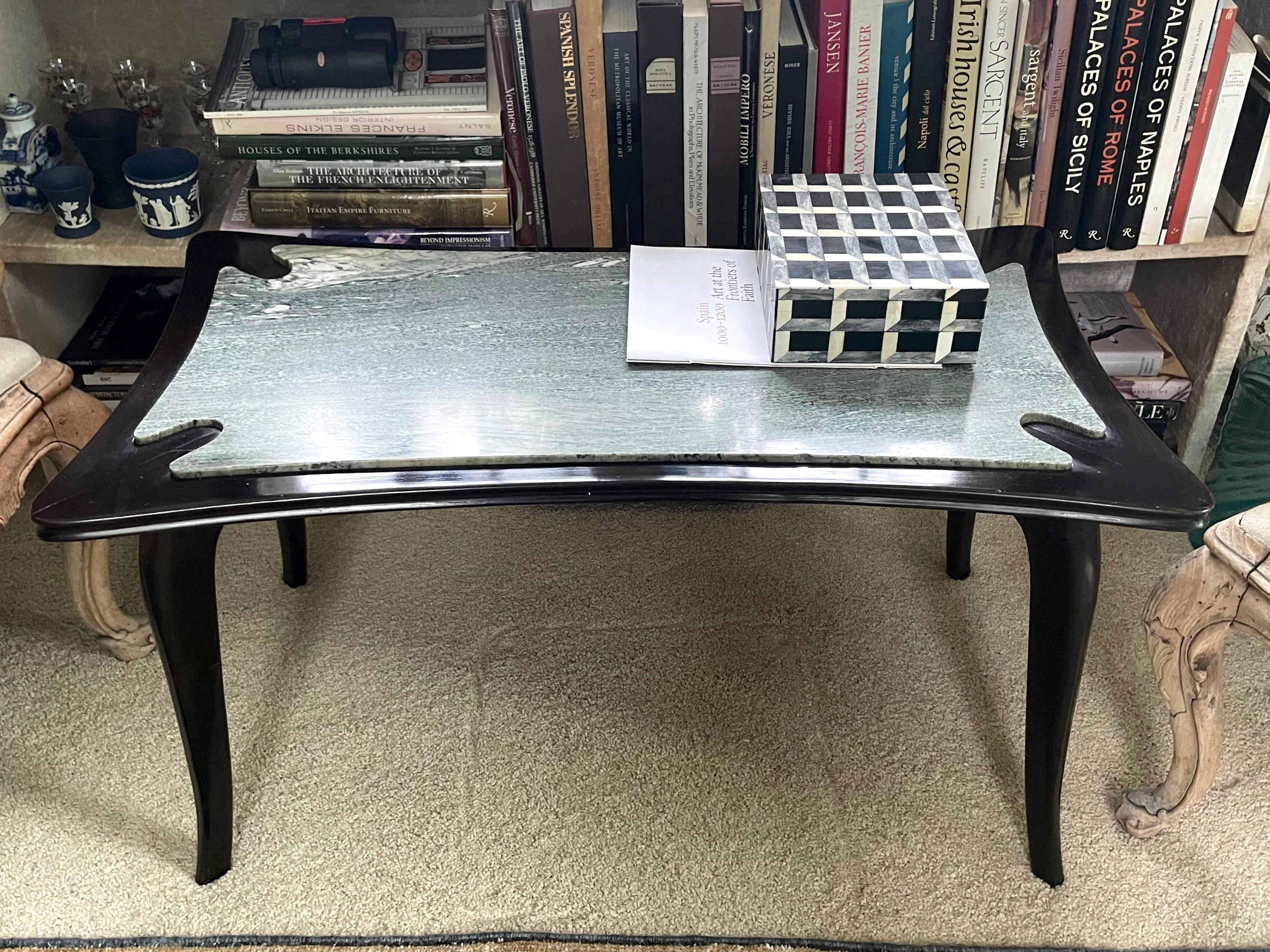 Italian mid-century marble top coffee table.  Vintage Italian moderne table with carved inset grey green and white marble top. Italy, circa 1940s.
Dimensions: 36