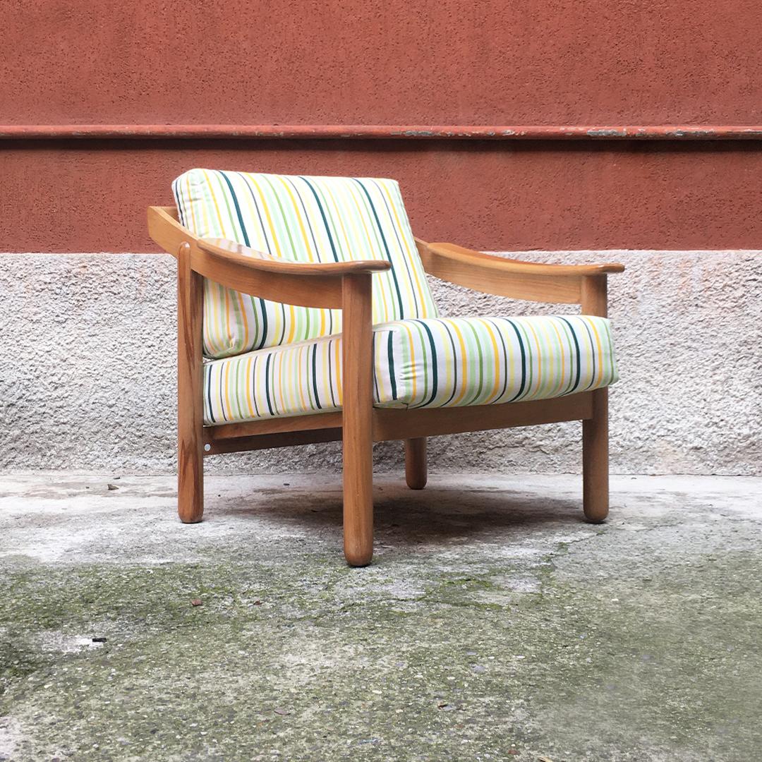 Italian midcentury Mod. Loden armchair by Vico Magistretti for Cassina, 1960s. 
Solid wood structure entirely re-polished, with original fabric on a white background and multicolored striped design of different widths.

Good